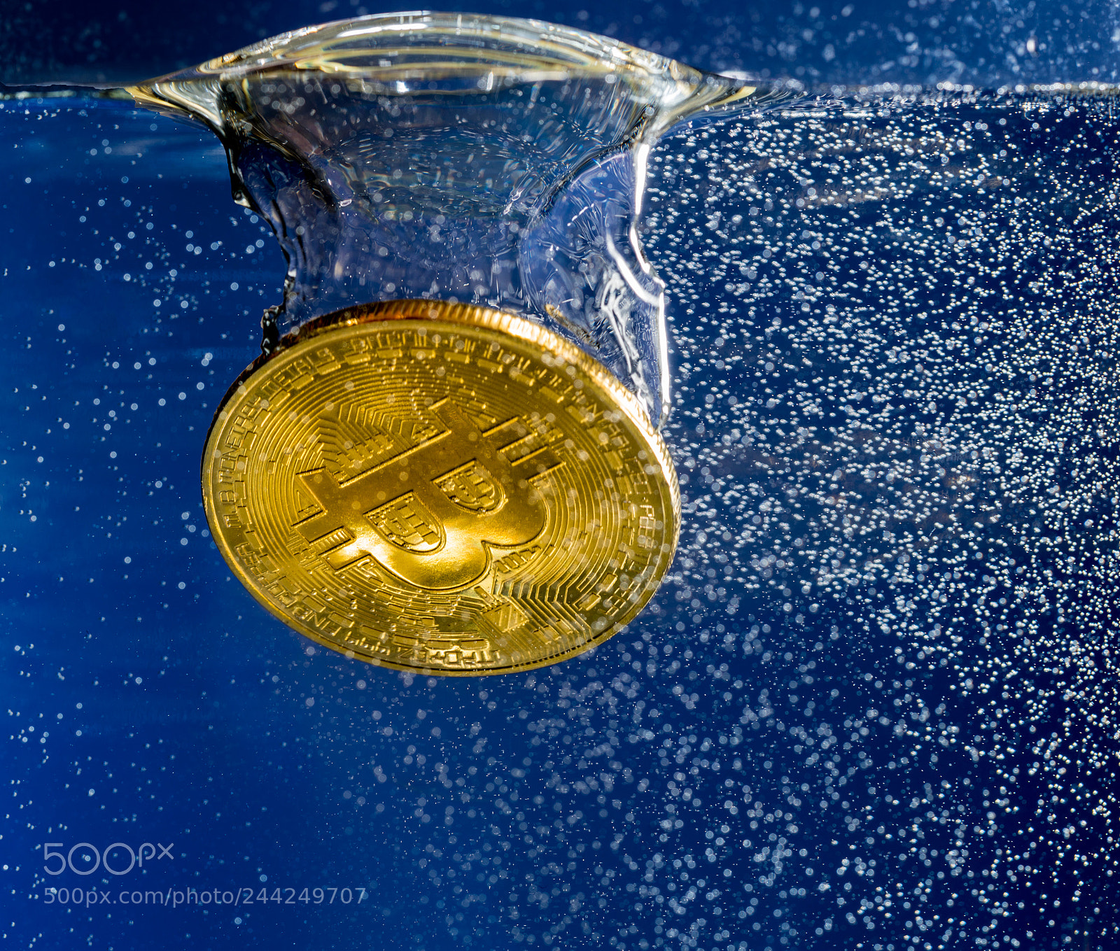 Sony a7R II sample photo. Bitcoin sinking through water photography