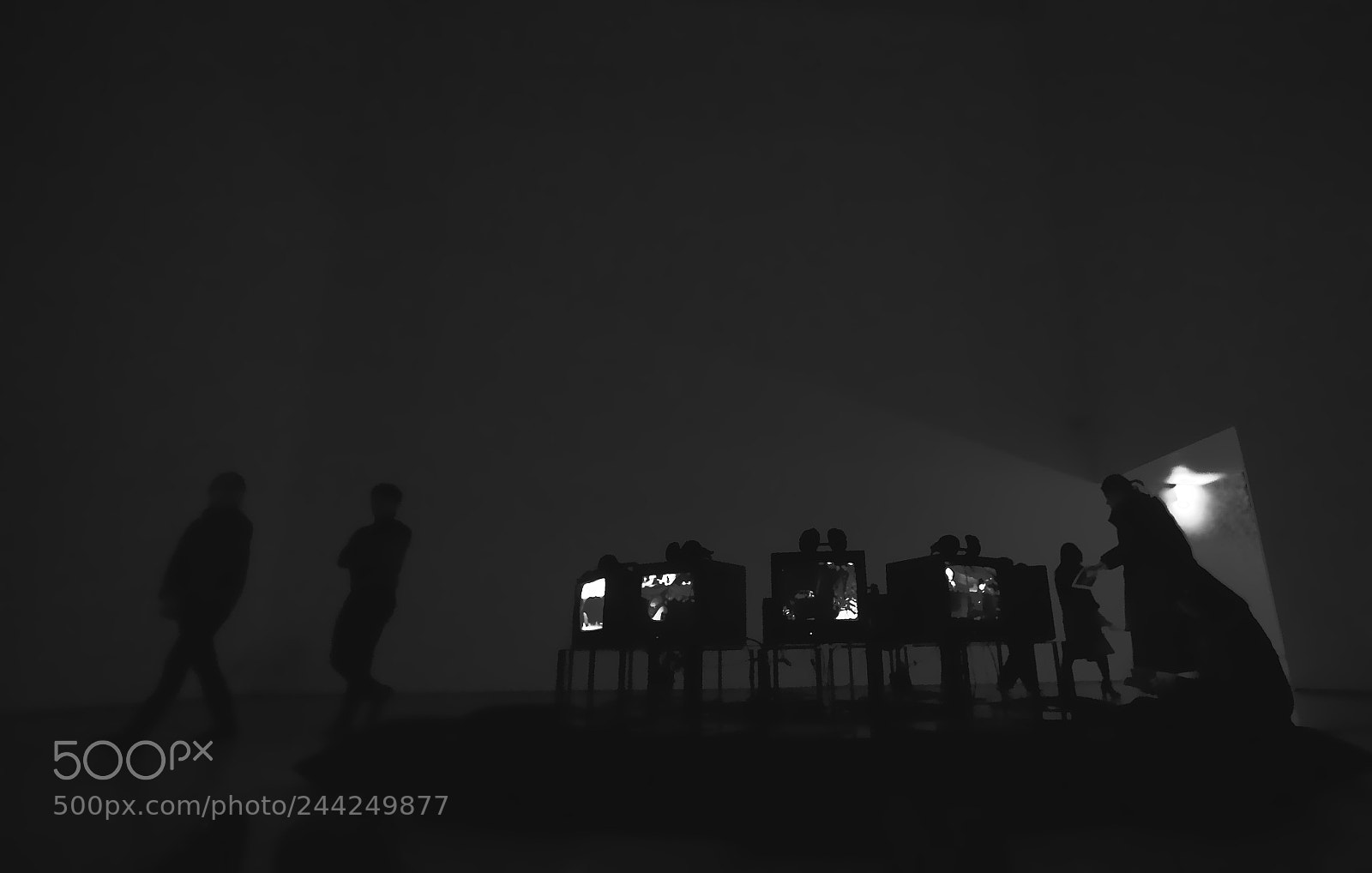 Olympus PEN-F sample photo. Dark video room photography