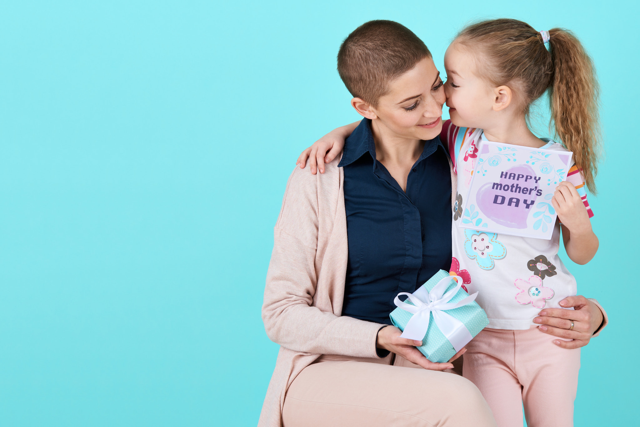 Nikon D810 + Nikon AF-S Nikkor 70-200mm F2.8G ED VR sample photo. Happy mother's day. cute little girl giving mom mothers day card and a present. mother and... photography