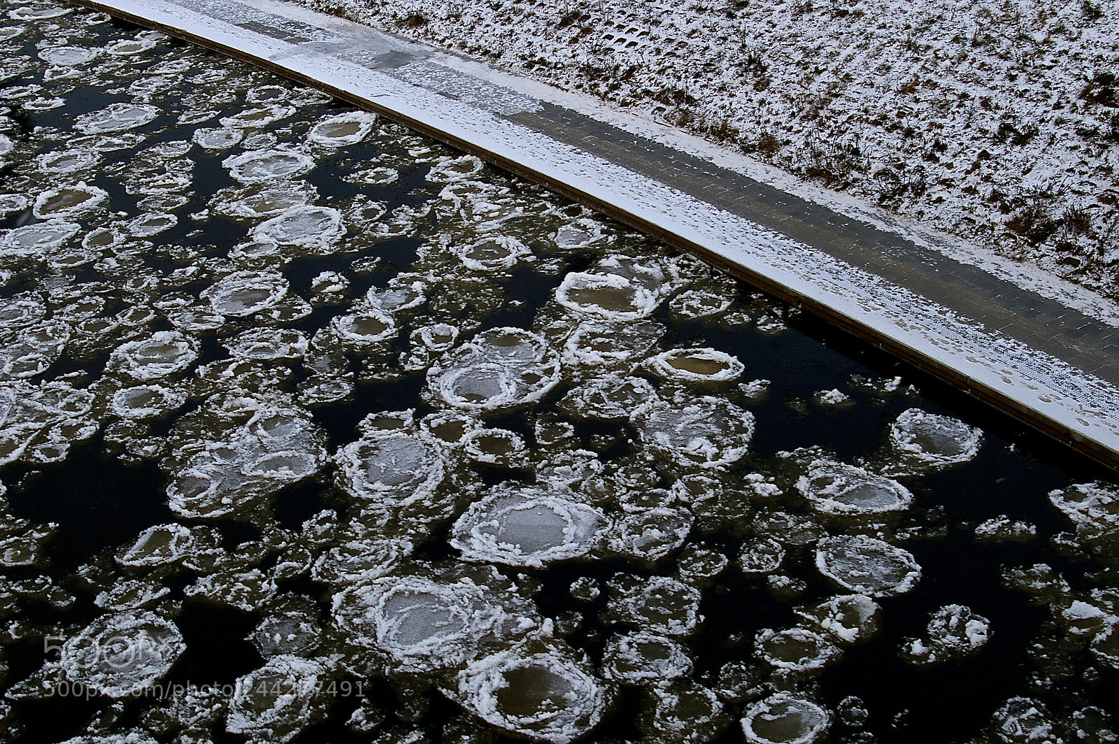 Pentax K100D sample photo. Frozen river photography