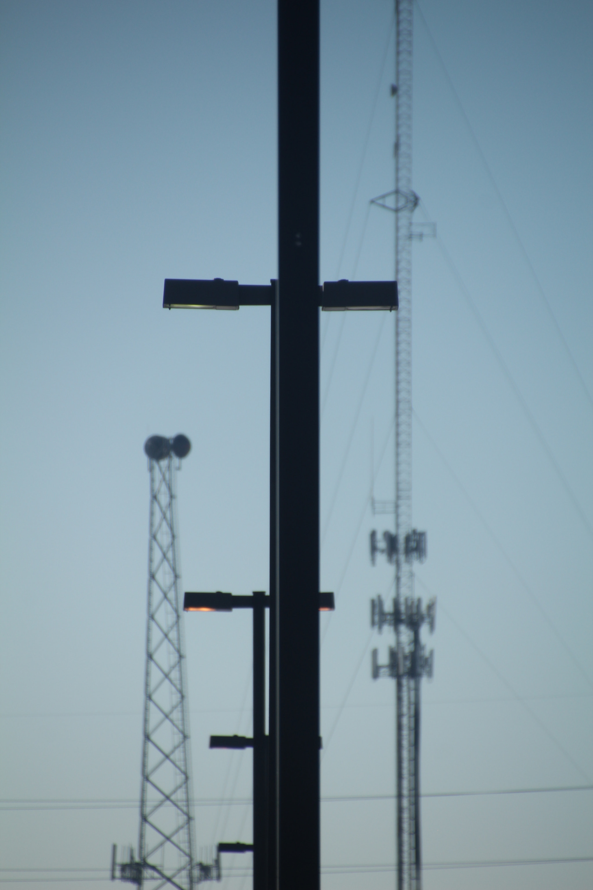 Canon EOS 1200D (EOS Rebel T5 / EOS Kiss X70 / EOS Hi) sample photo. Daylight, street lights, towers, and contrast. photography