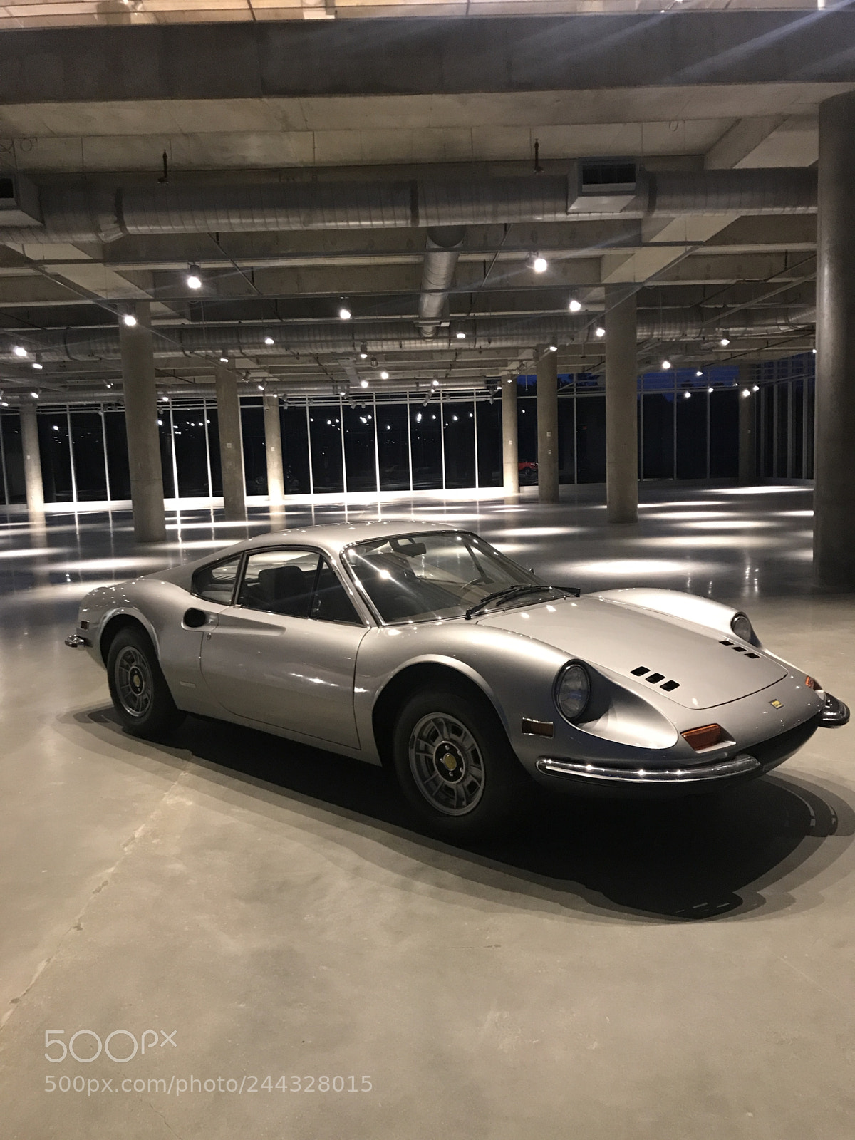 Apple iPhone 7 sample photo. Ferrari in empty building photography
