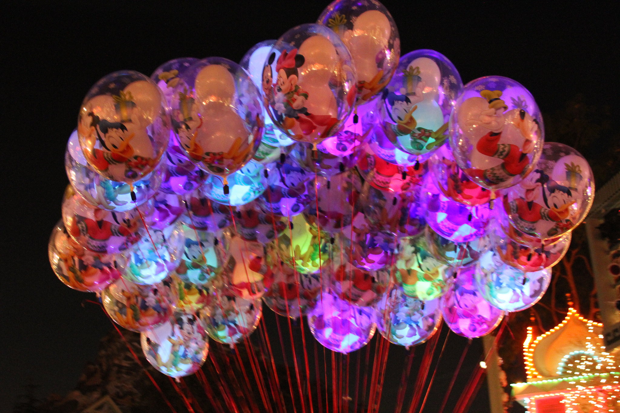 Canon EOS 7D + Canon EF 28-135mm F3.5-5.6 IS USM sample photo. Disneyland balloons photography