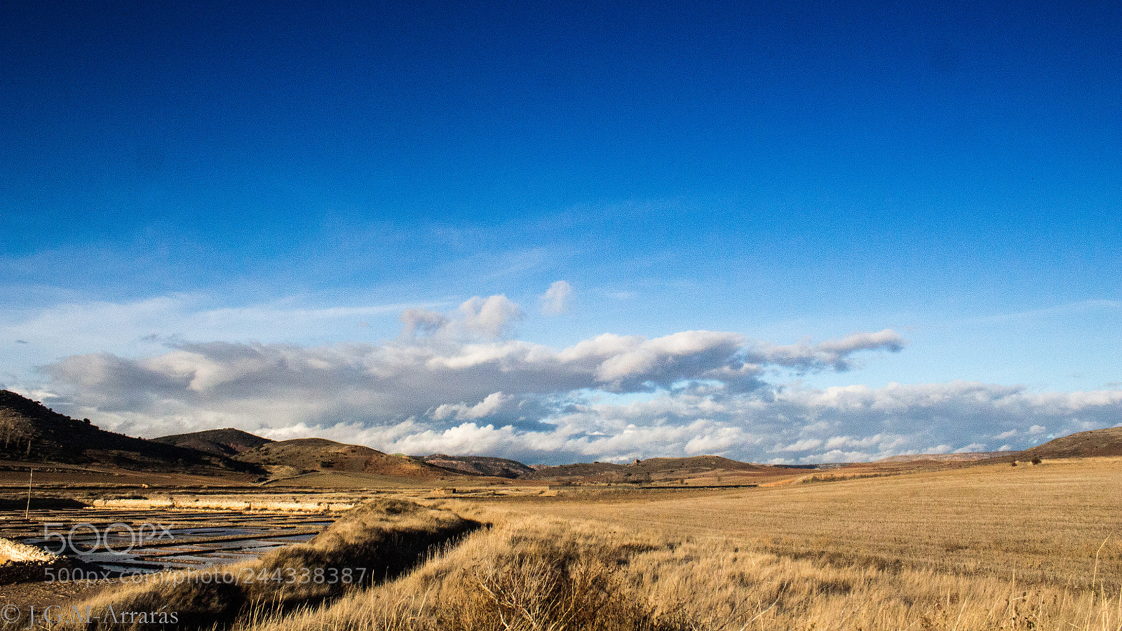 Canon EOS 100D (EOS Rebel SL1 / EOS Kiss X7) sample photo. Waving clouds photography