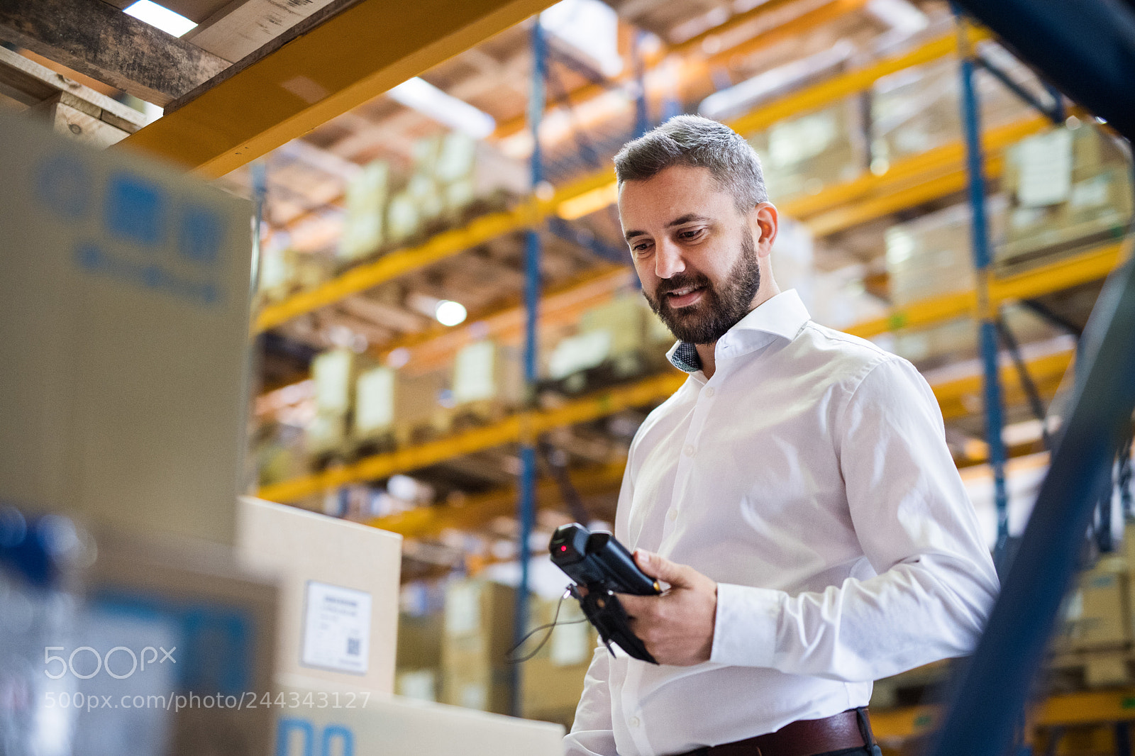 Nikon D5 sample photo. Warehouse worker or supervisor photography