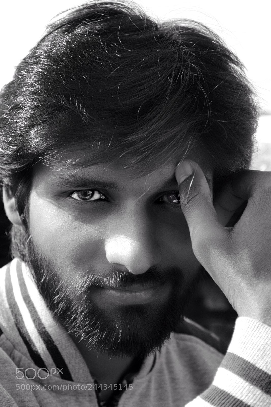 Nikon D3100 sample photo. Dramatic headshot photography