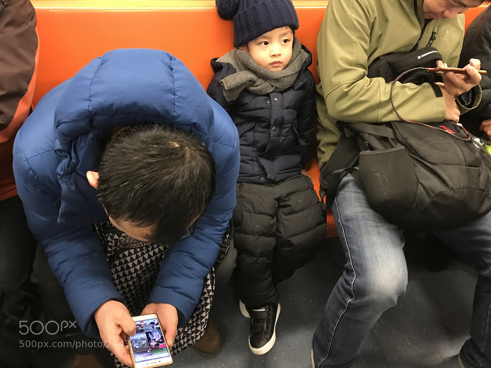 Apple iPhone 7 Plus sample photo. Boring kid in subway photography