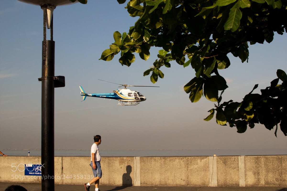 Nikon D80 sample photo. Low flying helicopter along photography