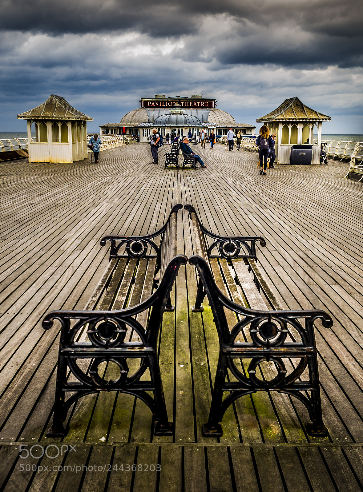 Olympus OM-D E-M10 sample photo. Southwold pier seats photography