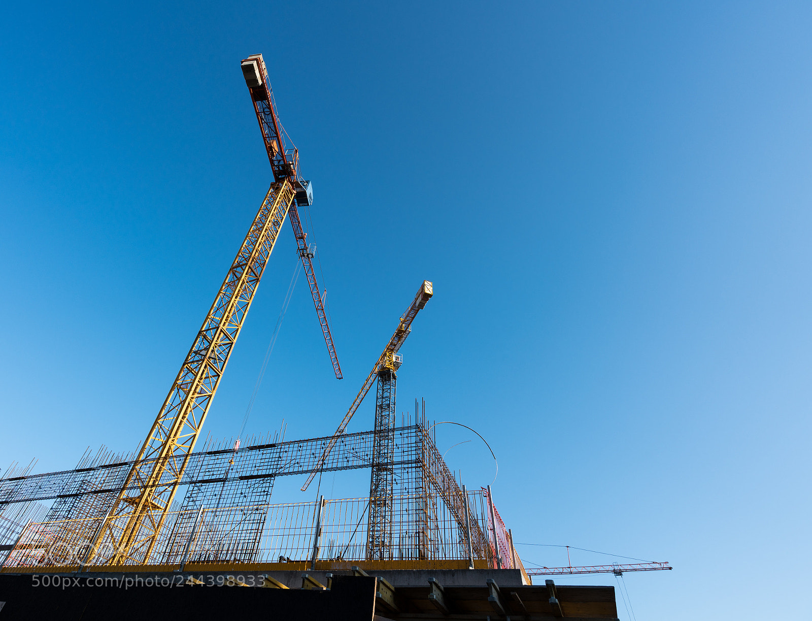 Sony a7R II sample photo. Cranes erecting new apartments photography