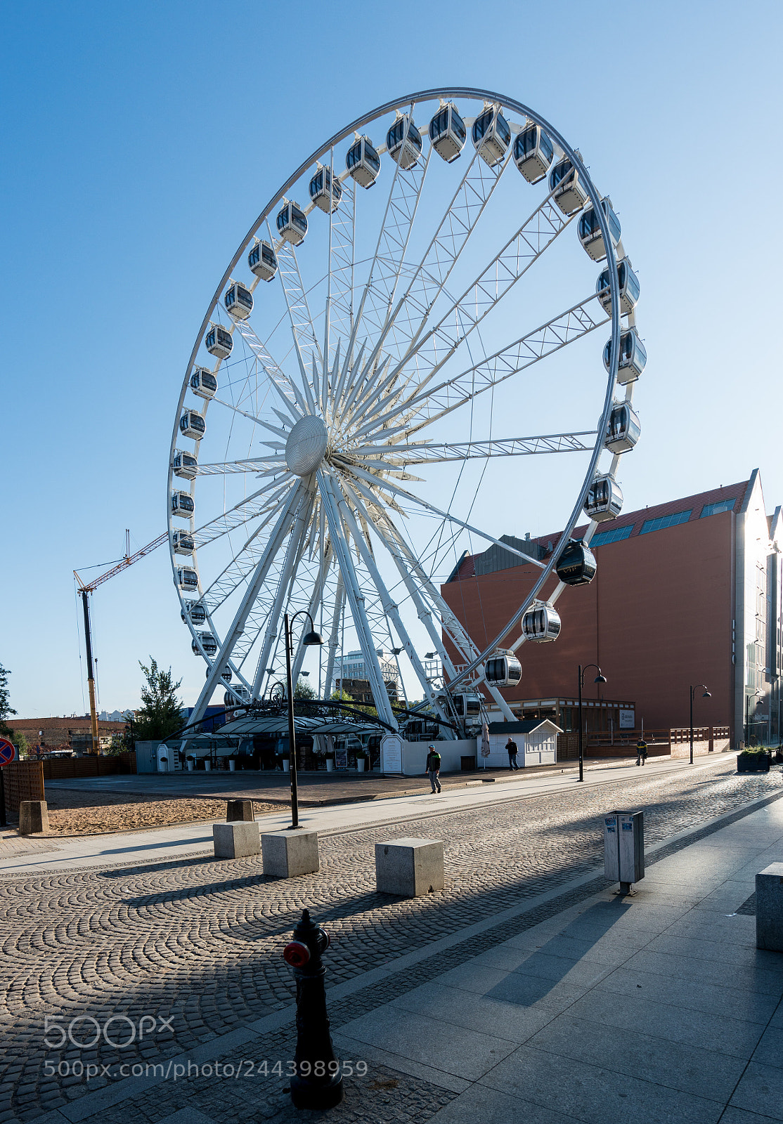 Sony a7R II sample photo. Amber sky ferris wheel photography