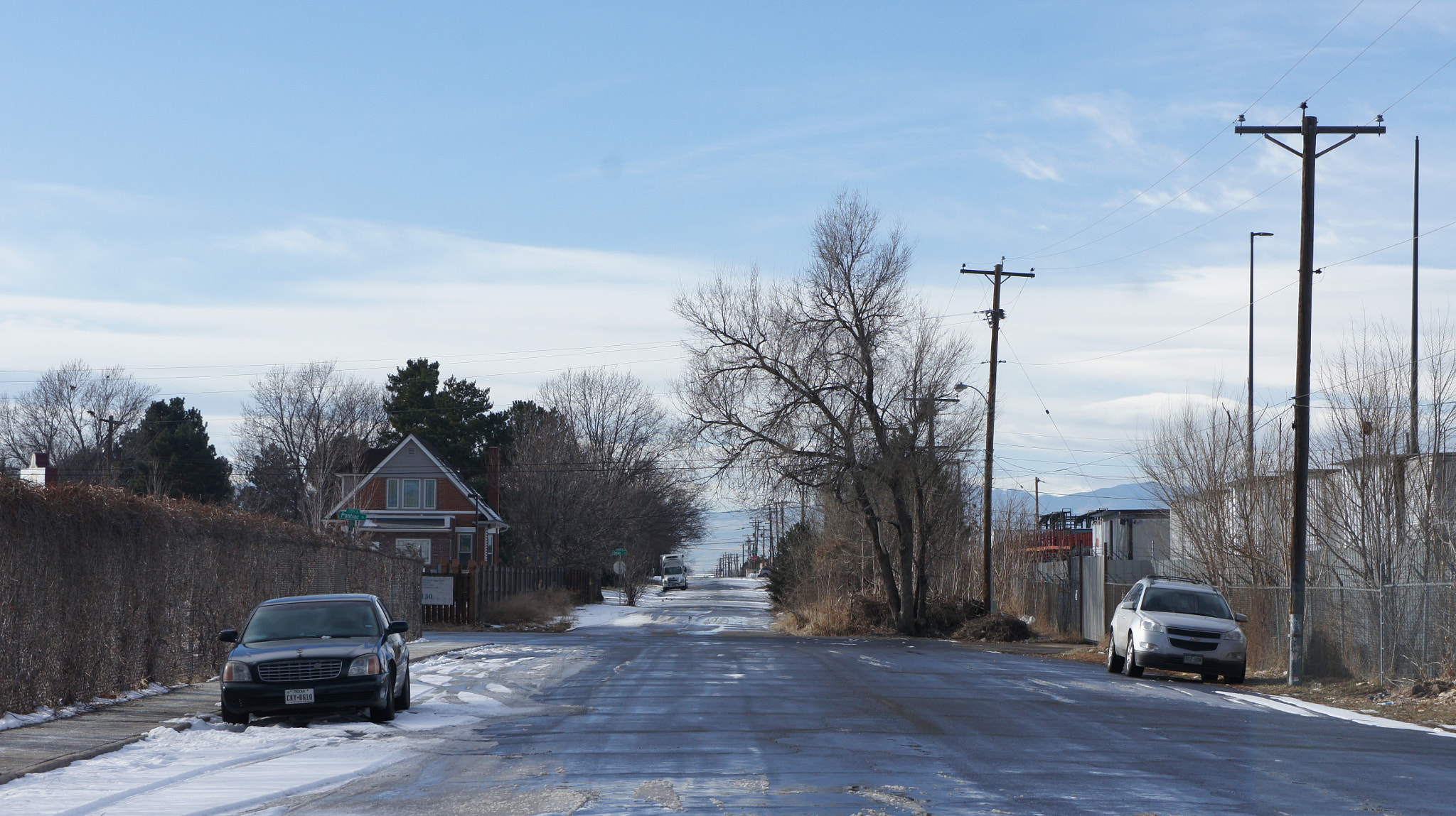 Sony Alpha NEX-3 + Sony E 18-55mm F3.5-5.6 OSS sample photo. The snow has arrived in the streets of denver photography