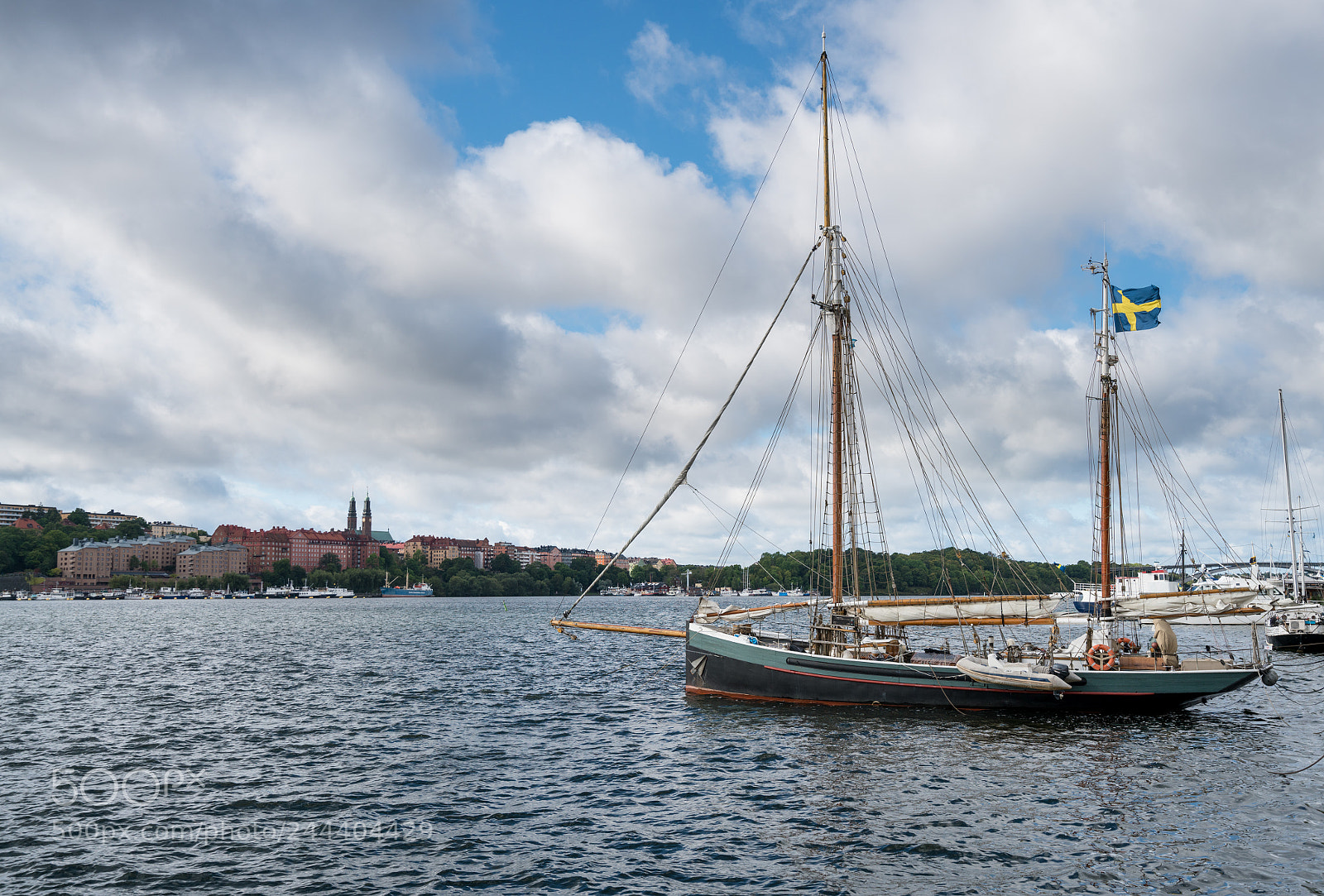 Sony a7R II sample photo. Sailing boat by city photography