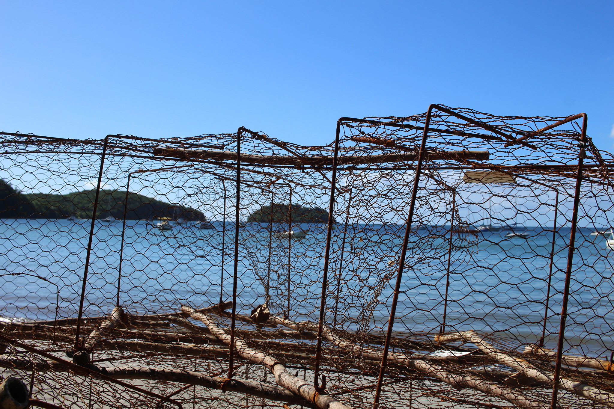 Canon EF-S 24mm F2.8 STM sample photo. La mer en cage photography