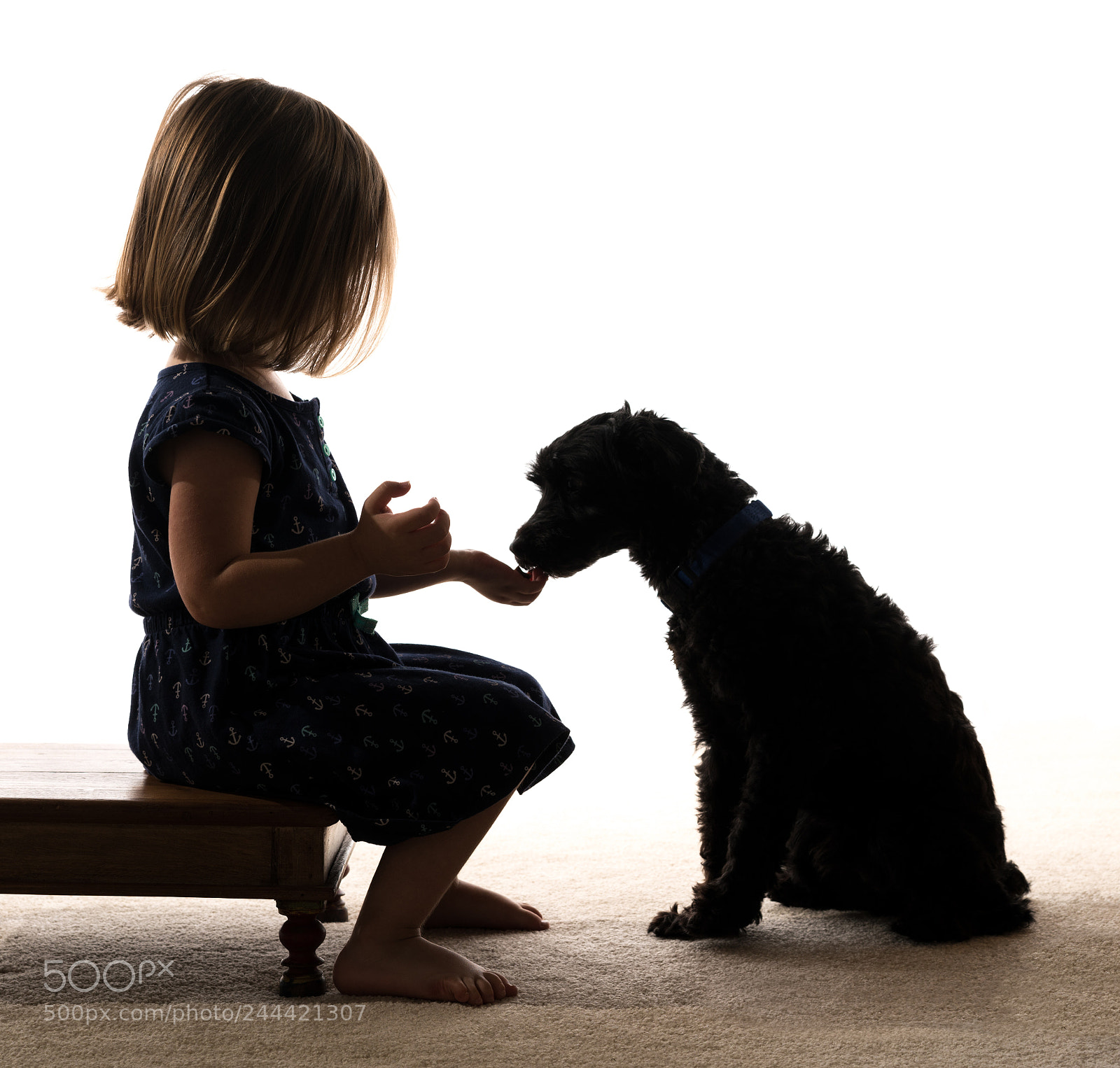 Sony a7R II sample photo. Silhouette of toddler feeding photography
