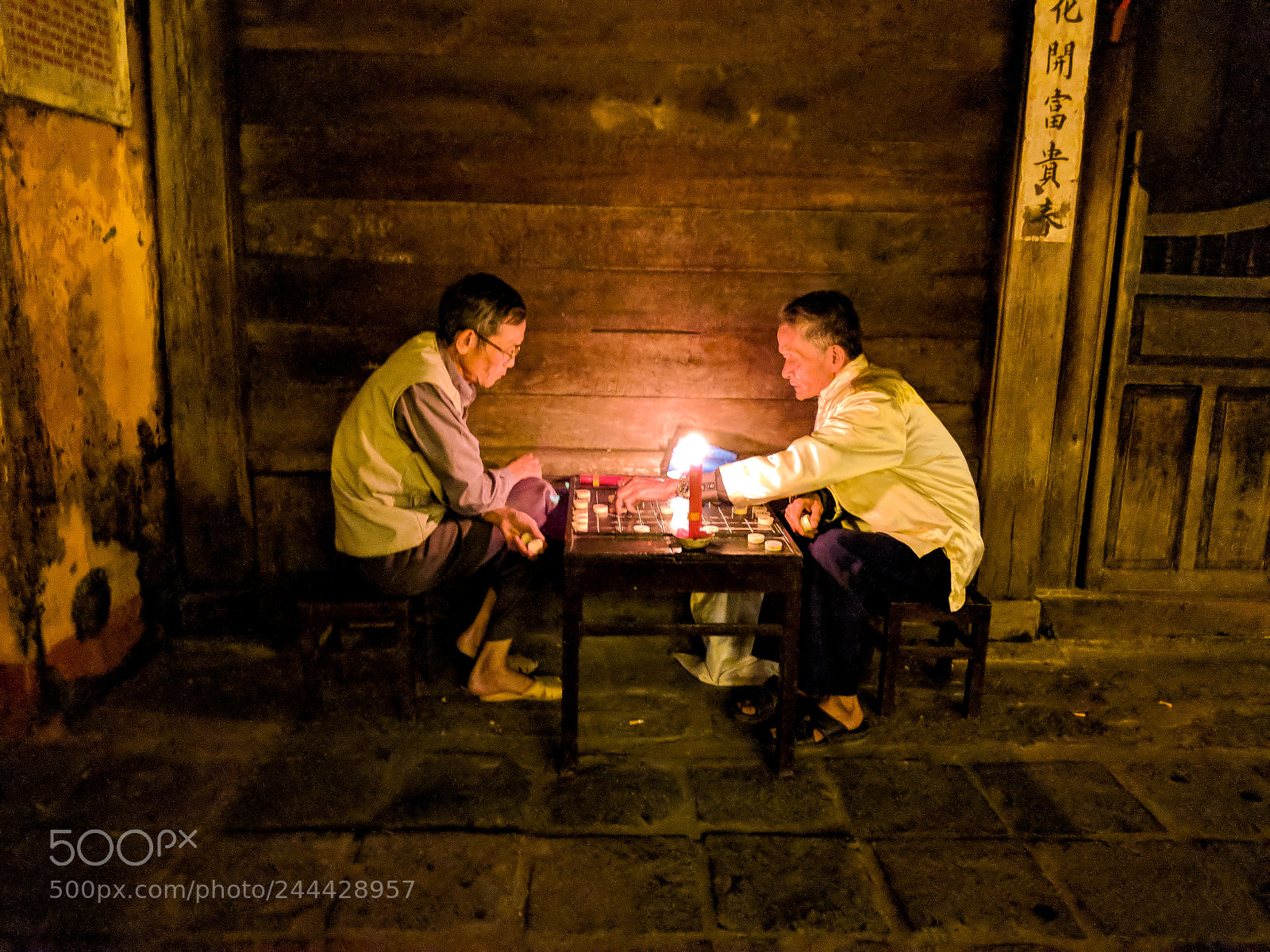 Google Pixel 2 sample photo. Checkers under candlelight photography