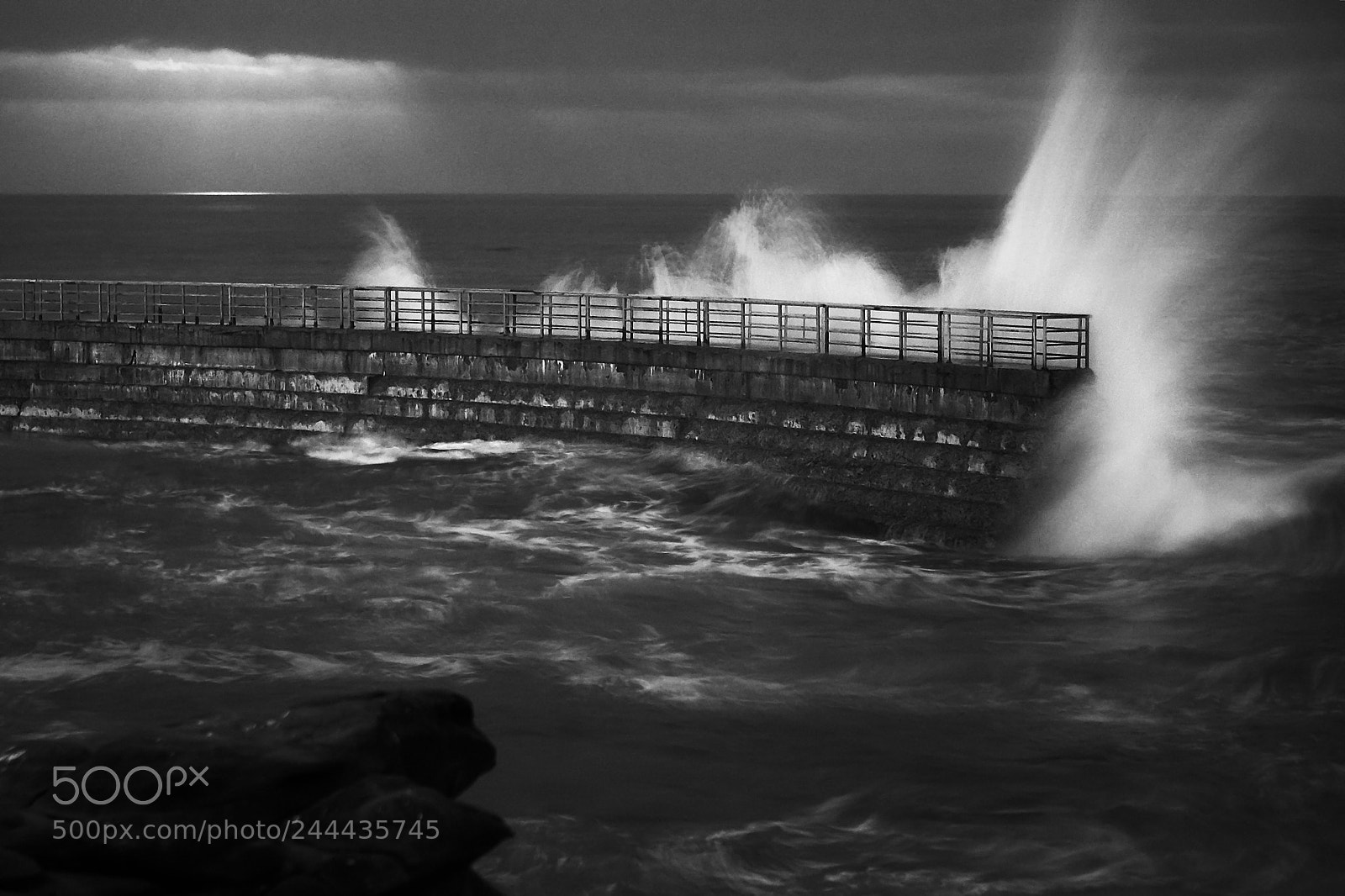 Sony a7R II sample photo. Waves hitting the barrier photography