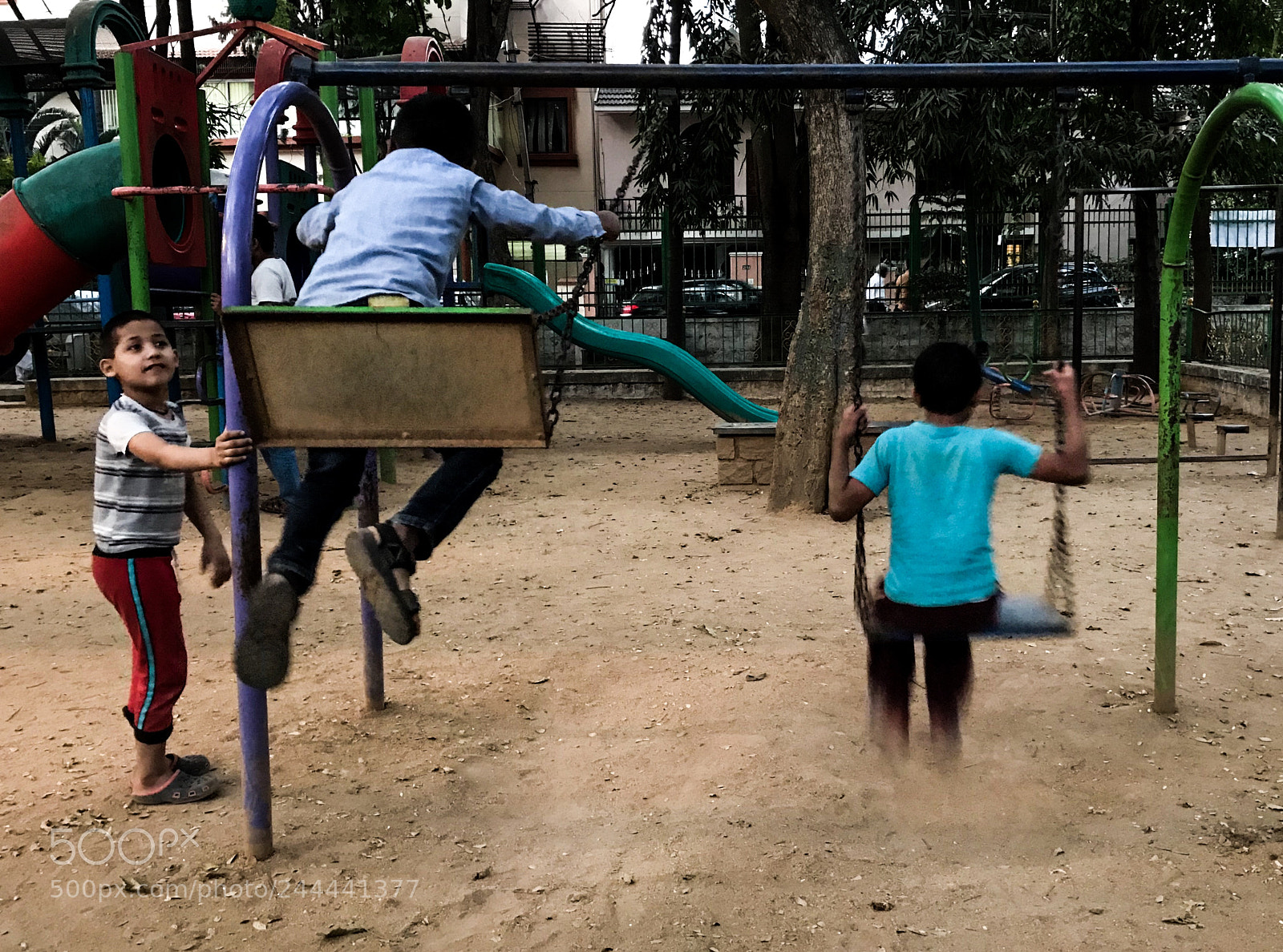 Apple iPhone 7 Plus sample photo. Swinging in the park photography
