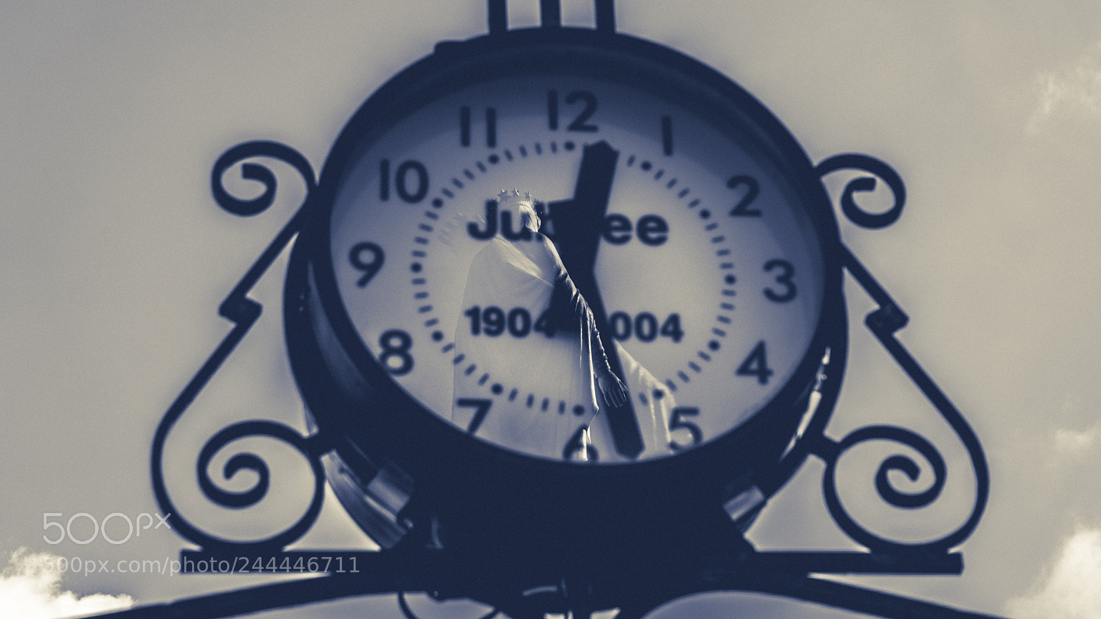 Sony a6300 sample photo. Clock reflection photography