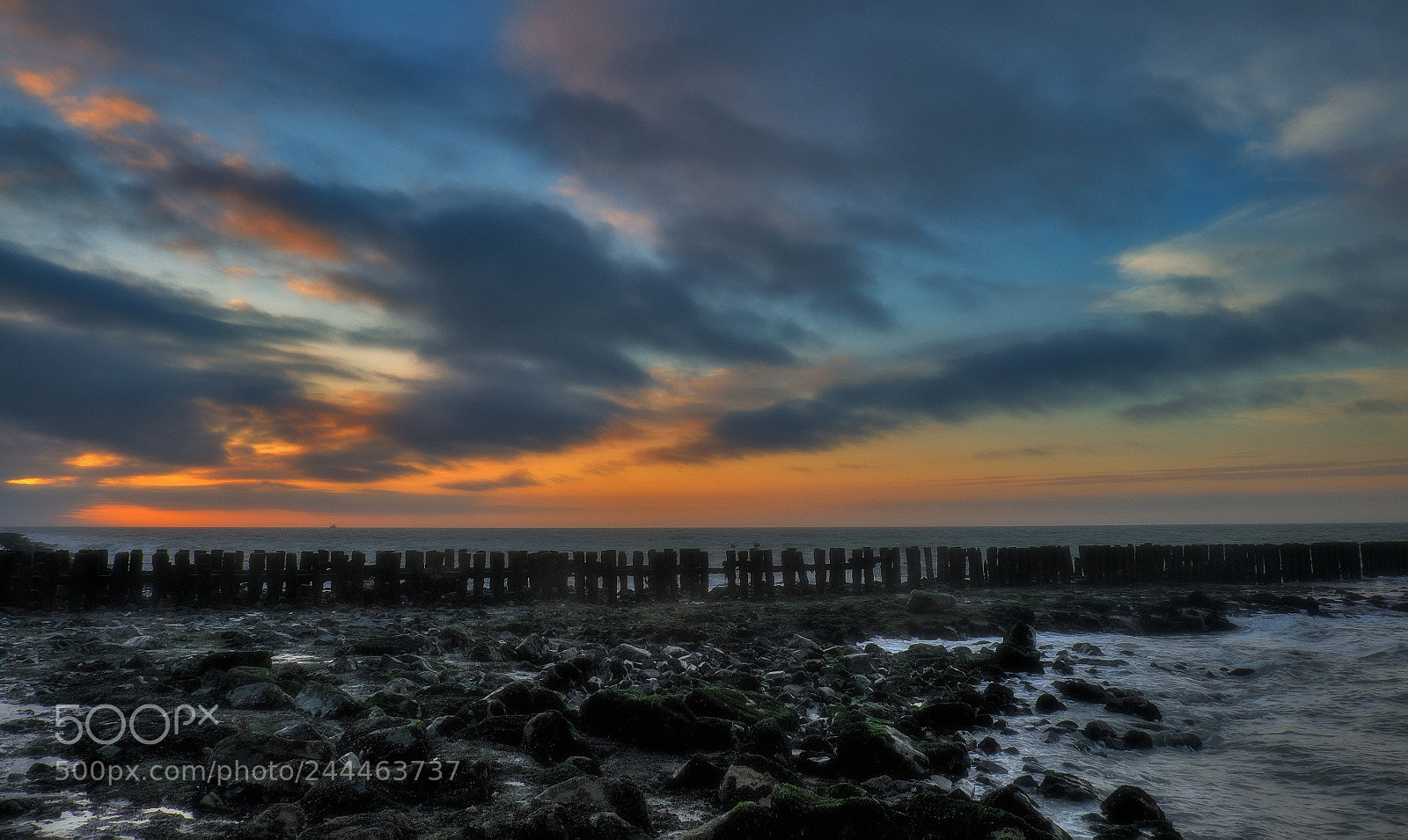 Fujifilm X-T1 sample photo. Sunset behind the breakwater photography