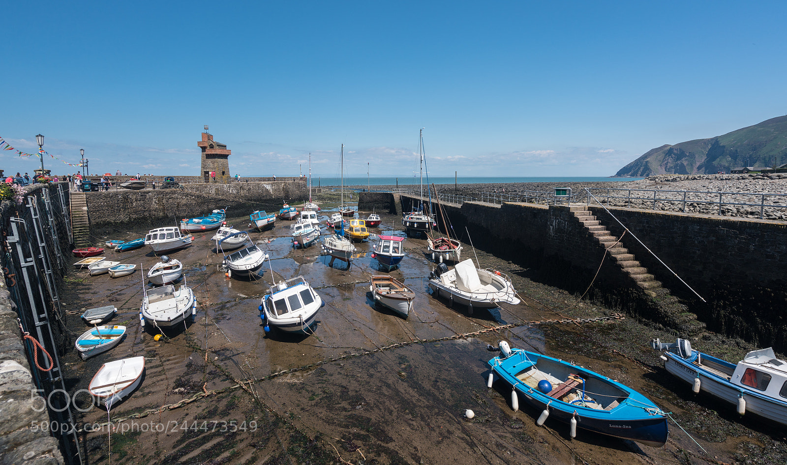 Sony a7R II sample photo. Boat beached in mud photography