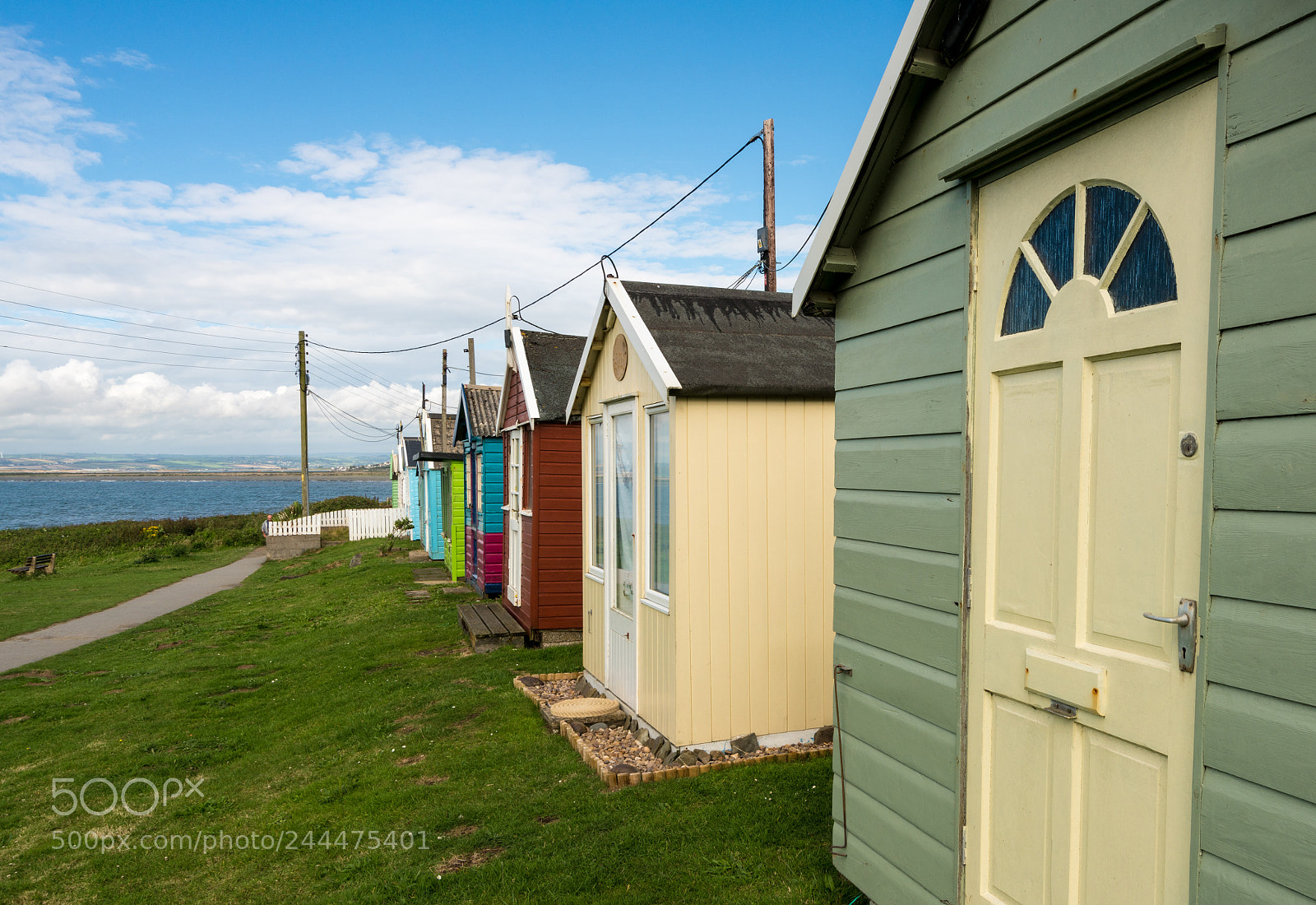 Sony a7R II sample photo. Colorful beach side huts photography