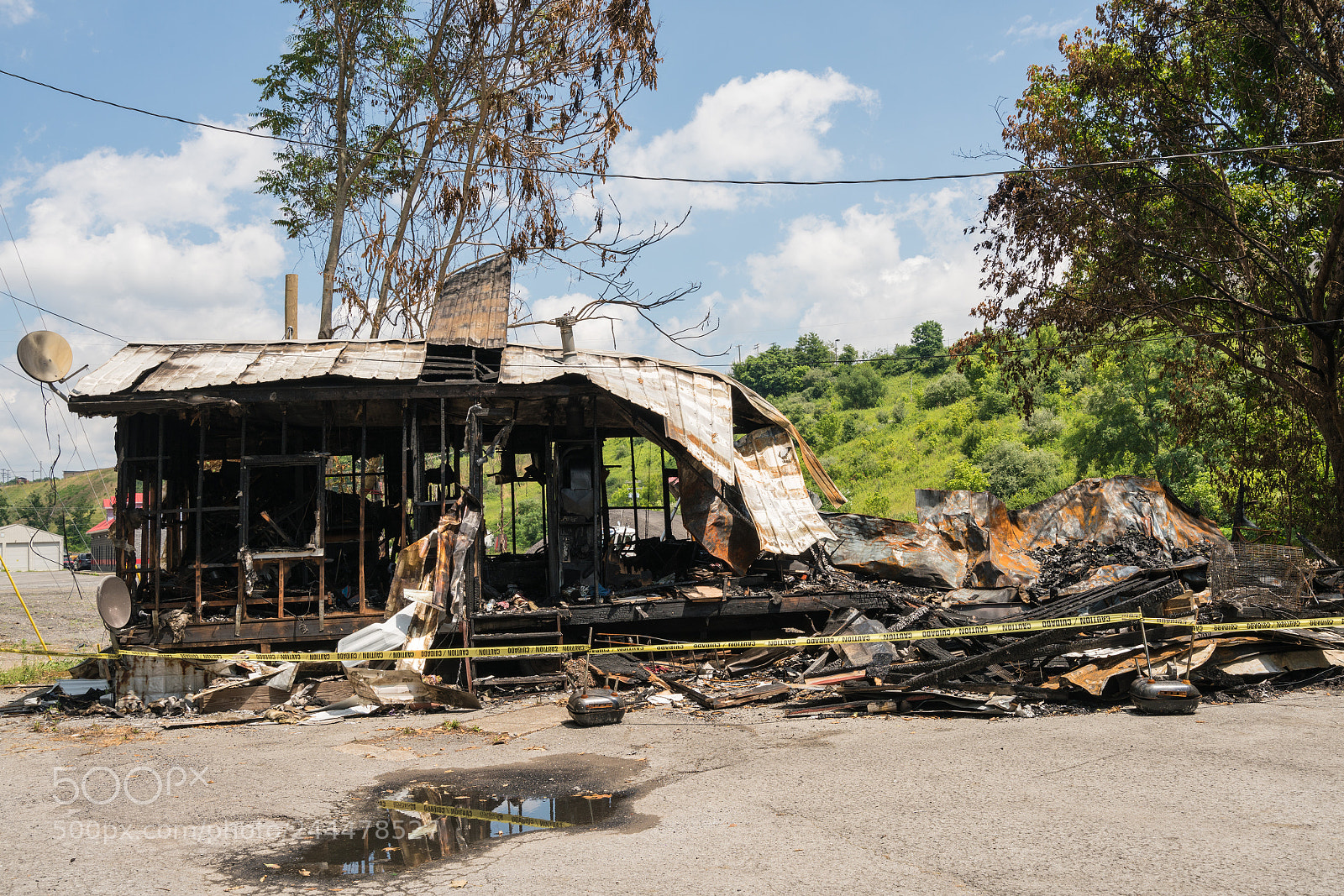 Sony a7R II sample photo. Burned ruins of wooden photography