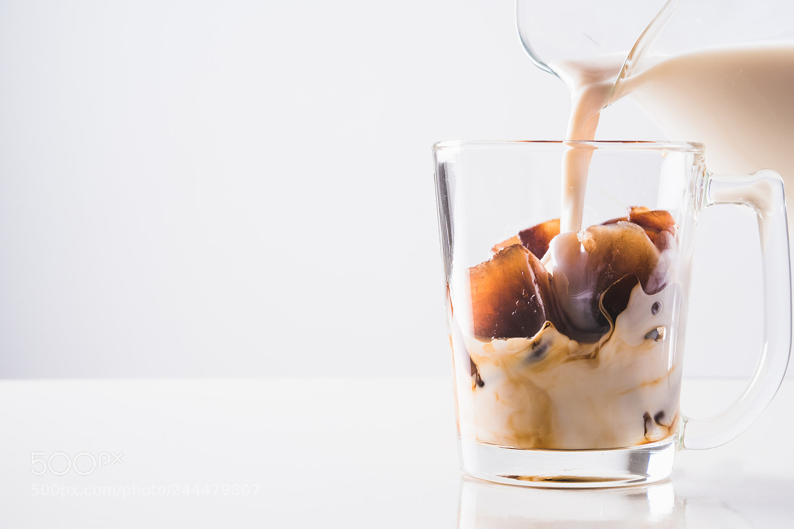 Olympus PEN-F sample photo. Close up pouring milk photography