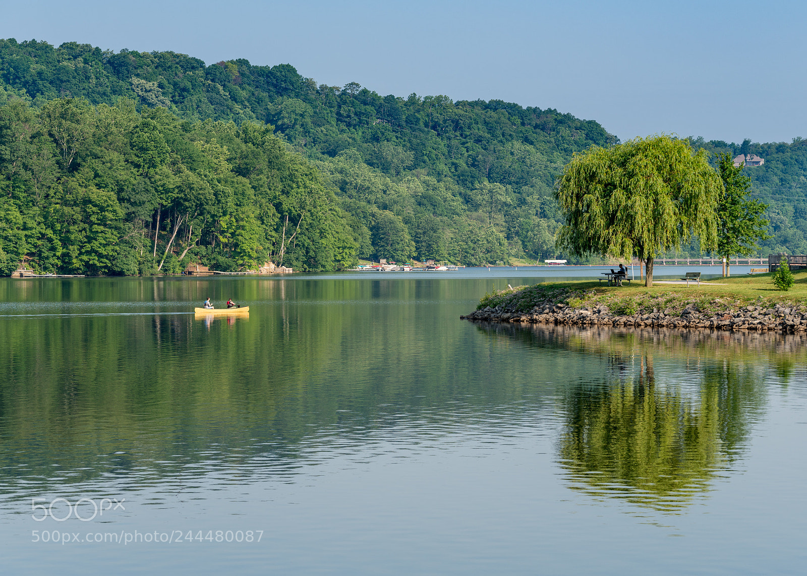 Sony a7R II sample photo. Couple paddling in yellow photography