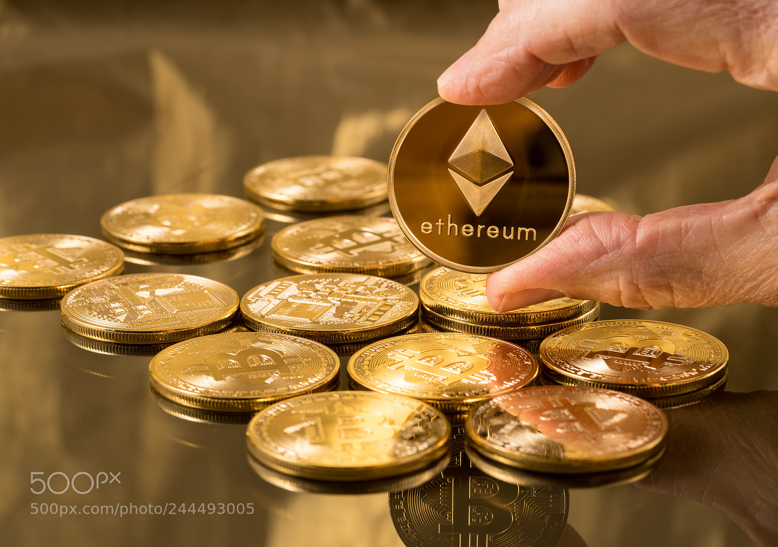Sony a7R II sample photo. Hand holding ether coin photography