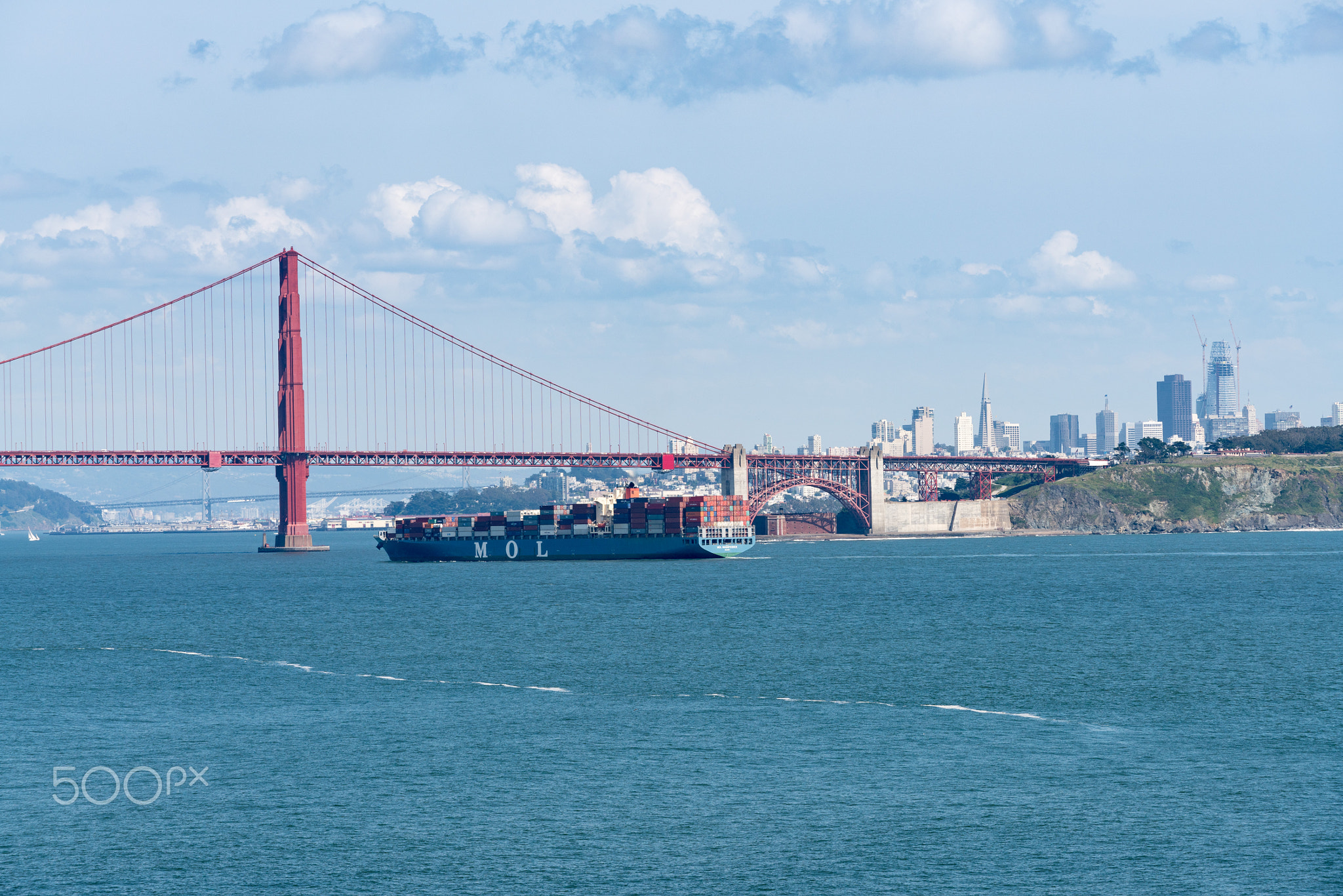 MOL Magnificence Container ship entering San Francisco Bay under Golden Gate Bridge