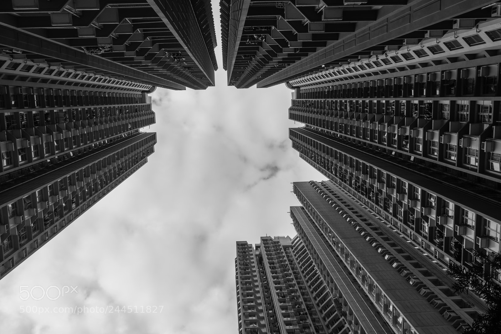 Sony a6500 sample photo. Man between buildings photography