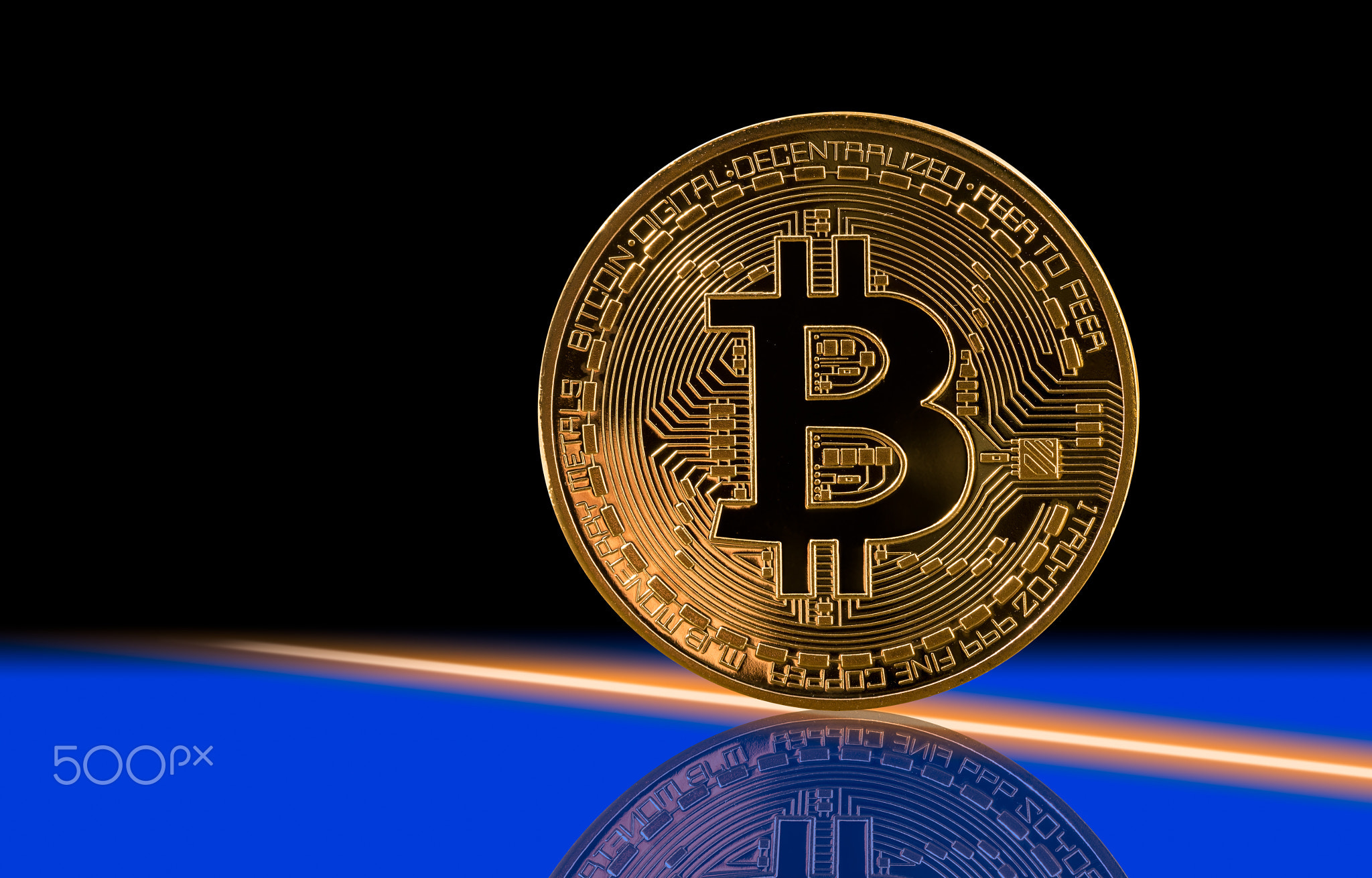 Single bitcoin with black background
