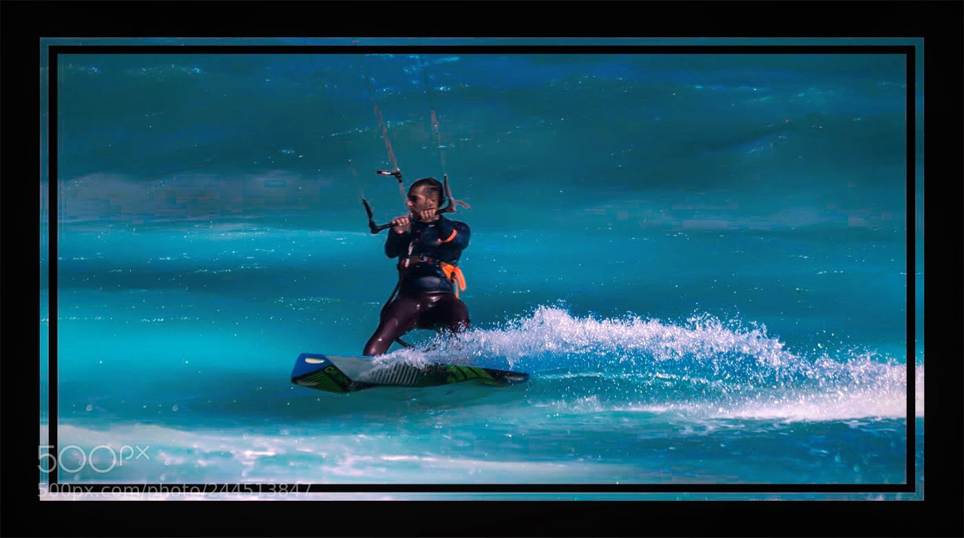 Olympus OM-D E-M5 II sample photo. Cutting through the surf photography
