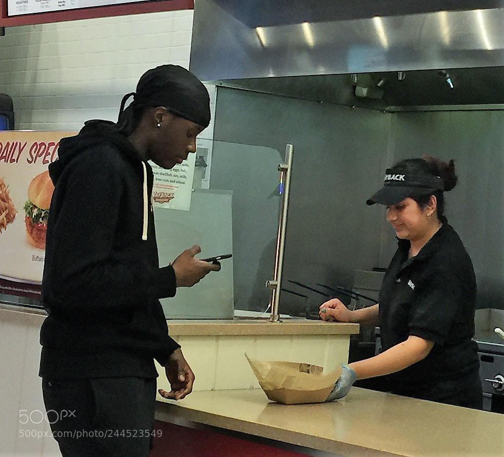 Apple iPhone 6 Plus sample photo. Getting his burger photography