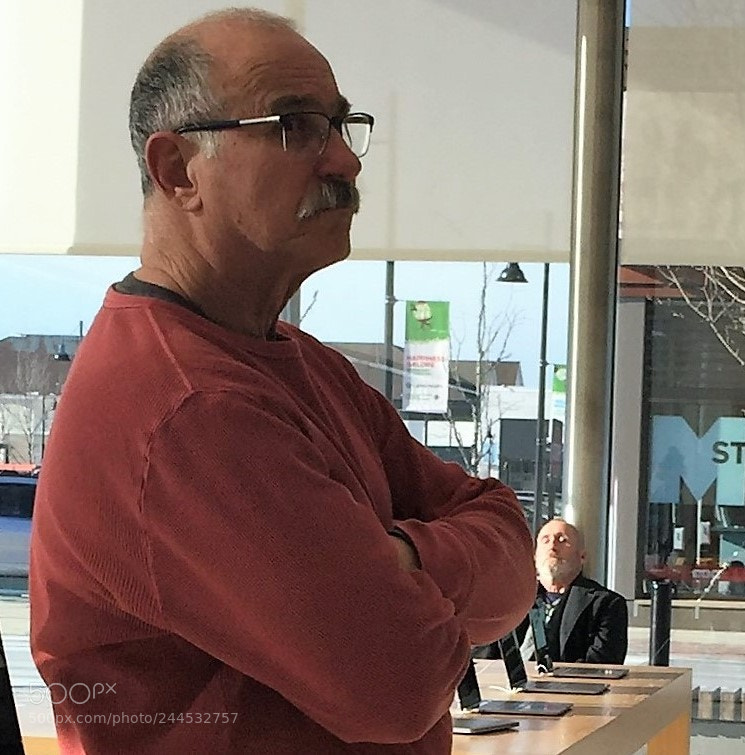 Apple iPhone 6 Plus sample photo. One customer waiting for photography