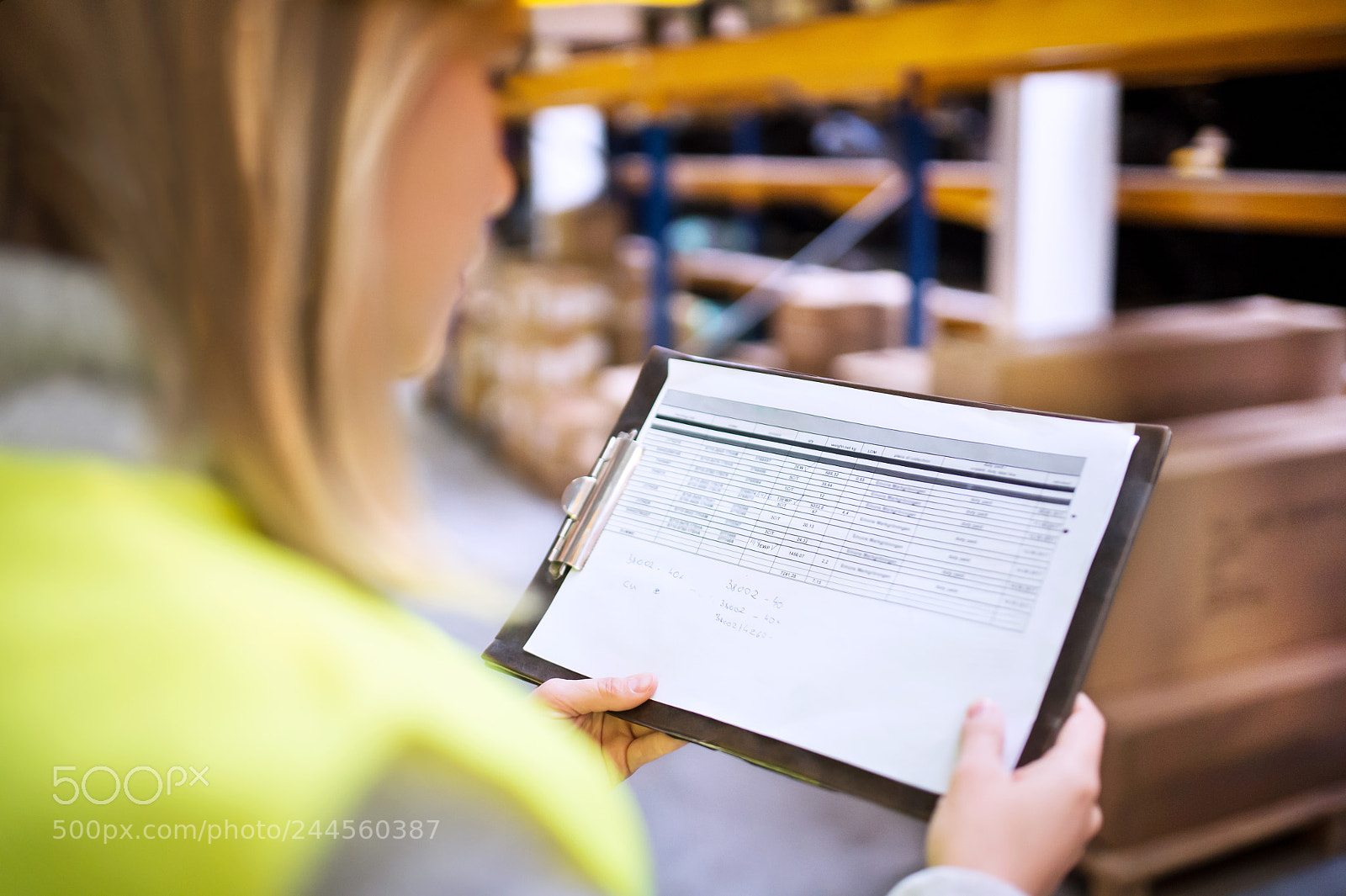 Nikon D4S sample photo. Young woman warehouse worker. photography