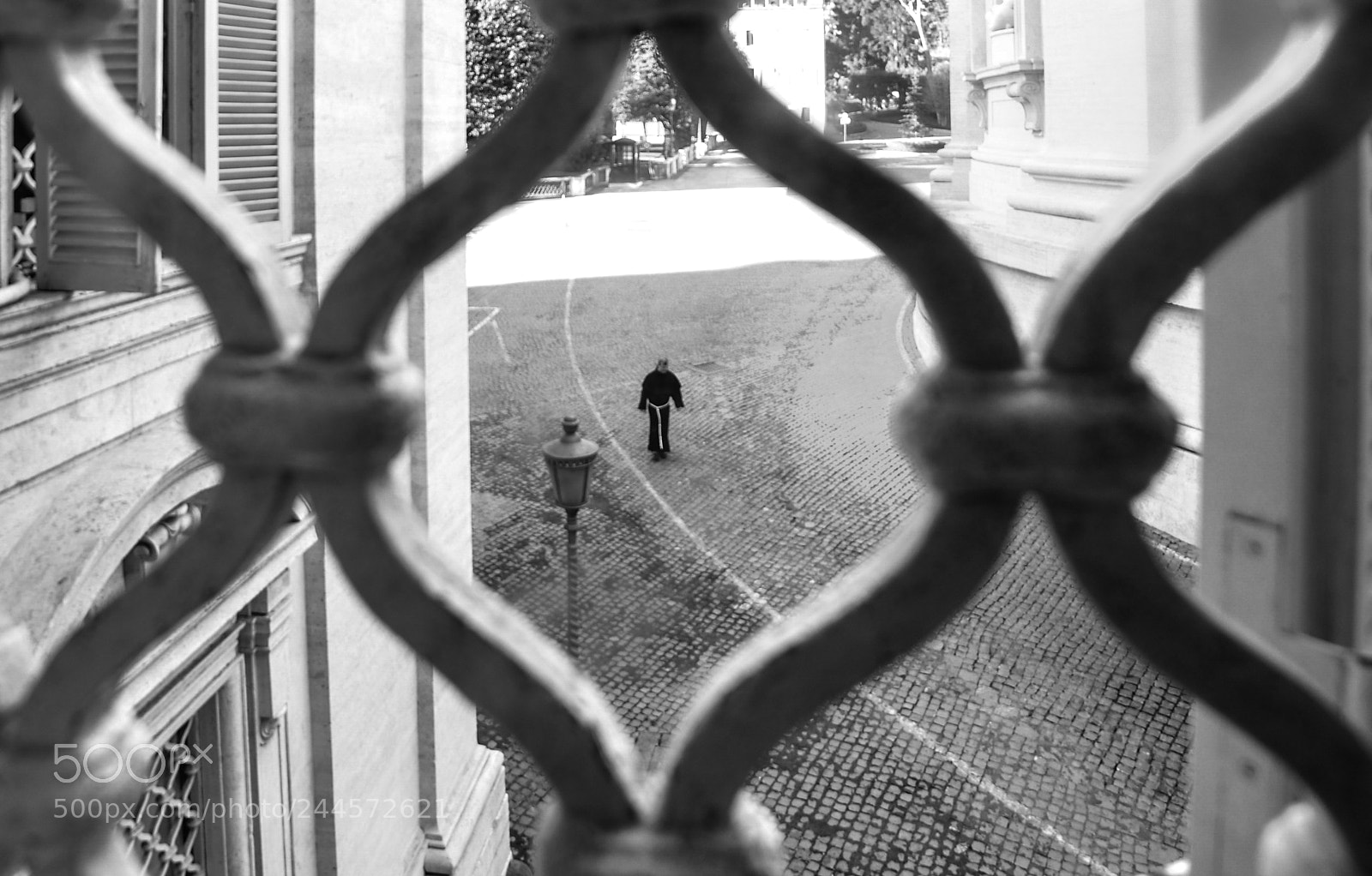 Nikon D610 sample photo. A priest is walking photography
