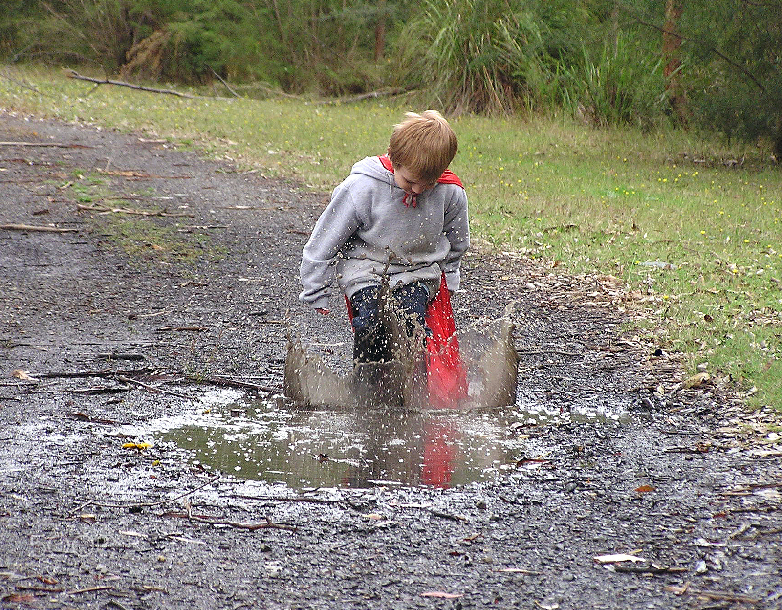 Olympus C740UZ sample photo. Jumping in puddles photography