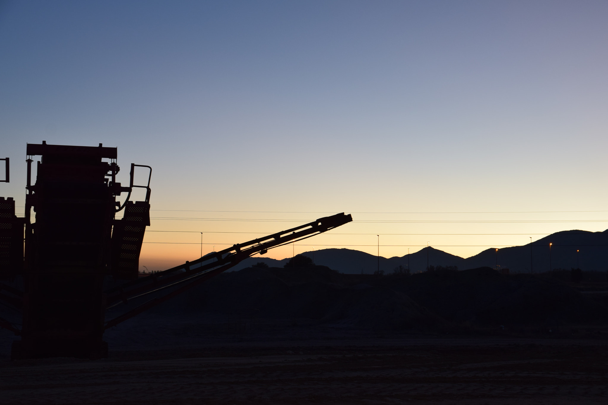 Nikon D3300 + Sigma 17-70mm F2.8-4 DC Macro OS HSM | C sample photo. Heavy machinery in white sunset photography