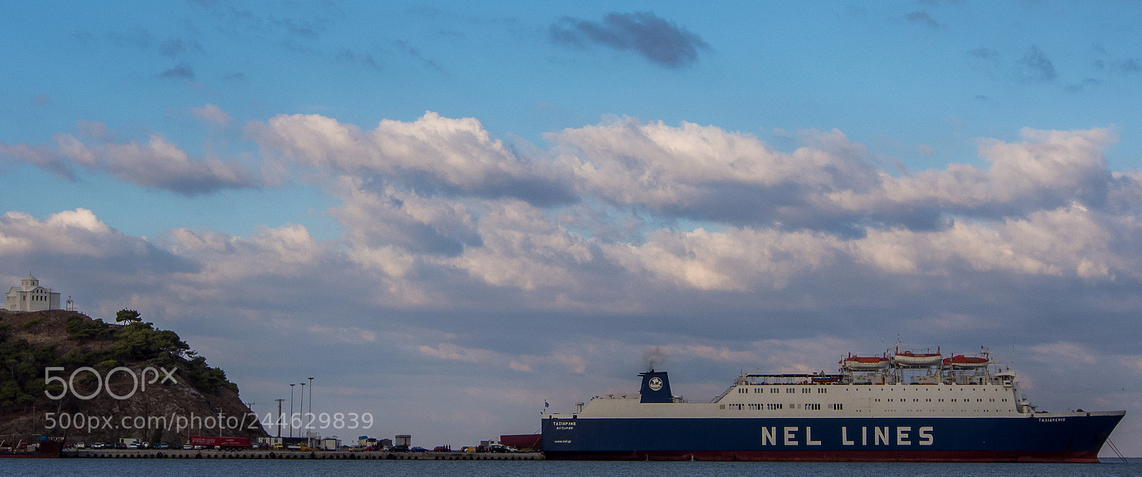 Olympus OM-D E-M5 sample photo. Ferry departs myrina harbour photography