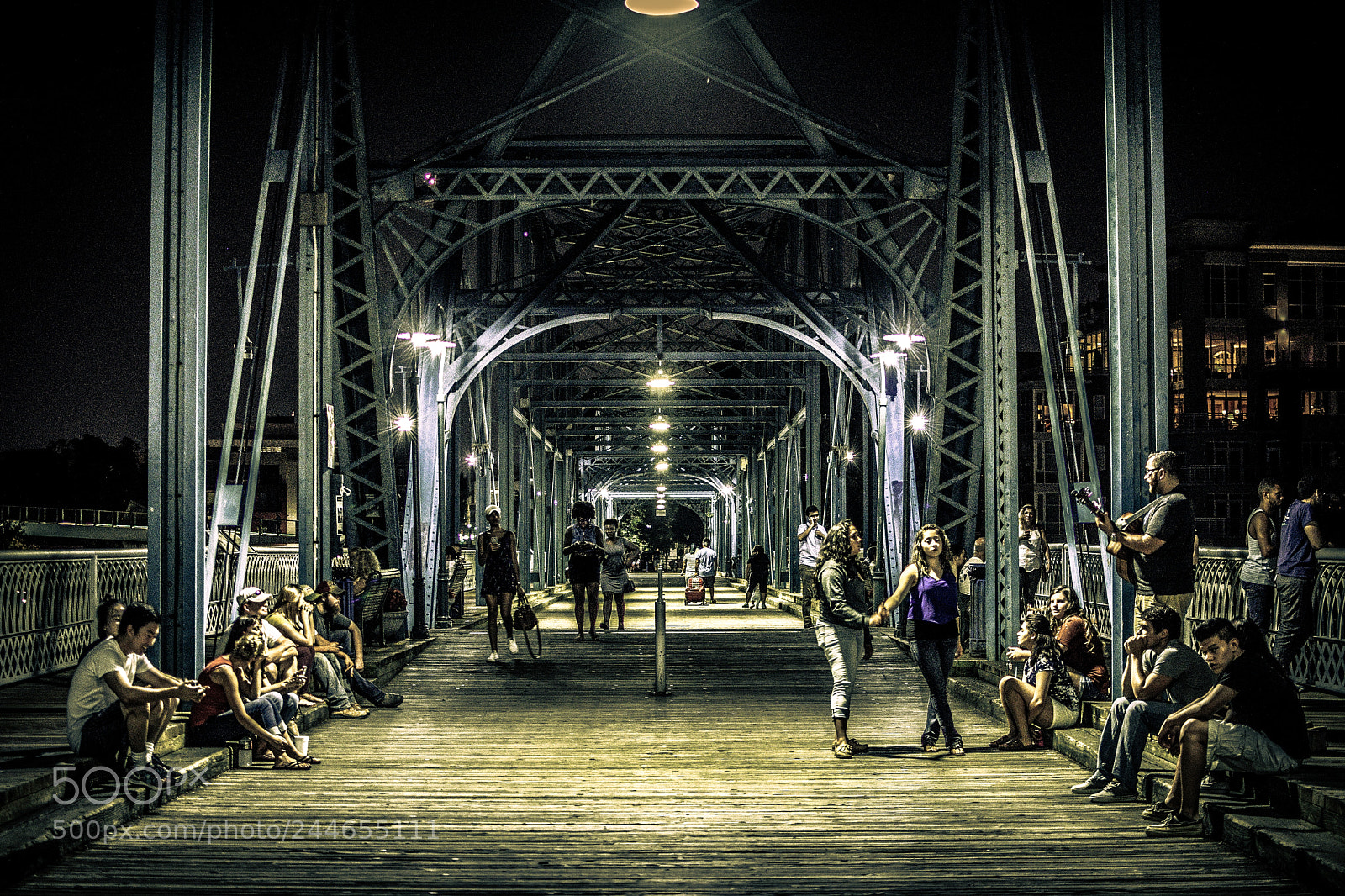 Nikon D7200 sample photo. Guitarist on night bridge photography