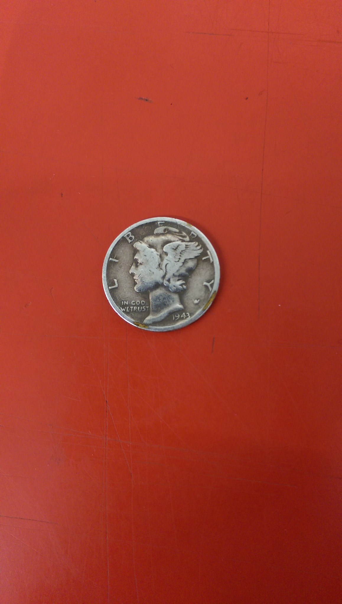 HTC ONE (M8) sample photo. Coin on scarred counter photography