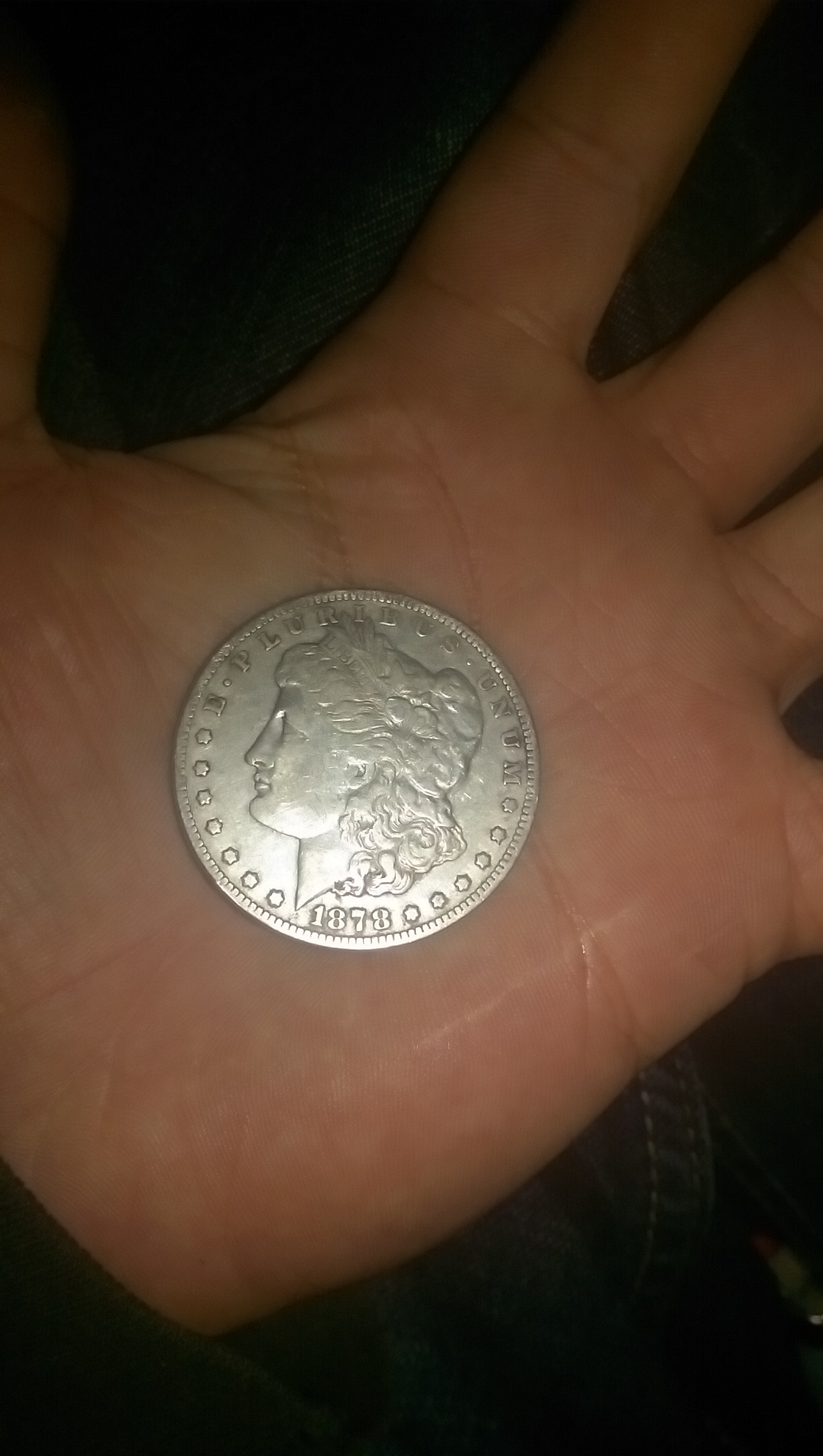 HTC ONE (M8) sample photo. Coin ..morgan dollar..in hand photography
