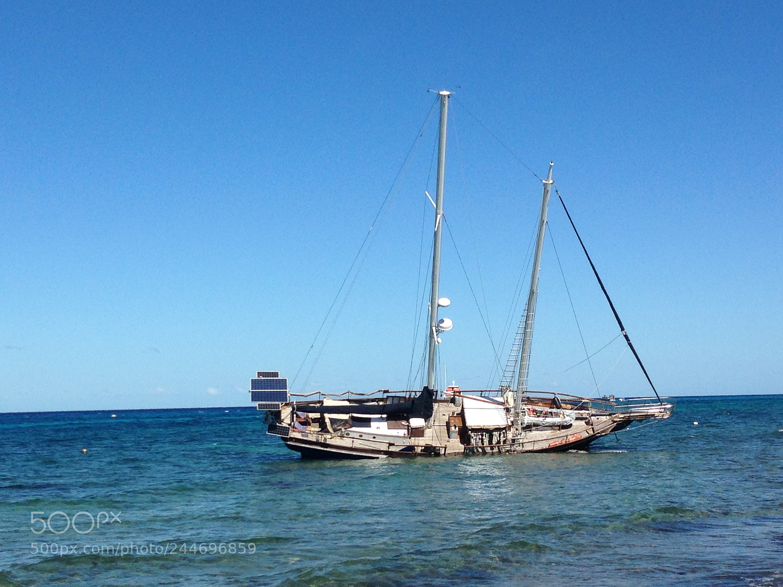 Apple iPhone 5 sample photo. Sinking boat photography