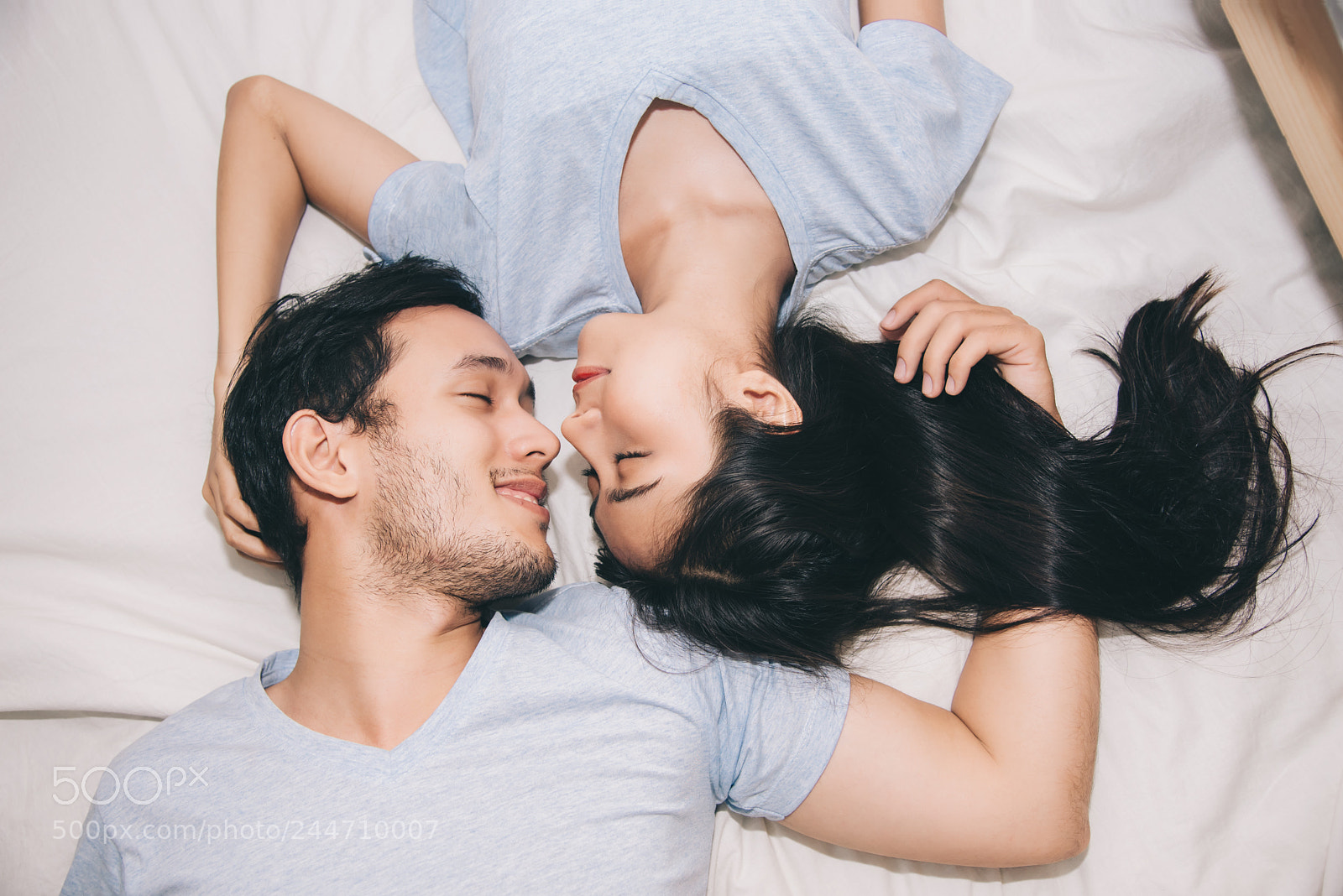 Nikon D600 sample photo. Sweet young couple lying photography