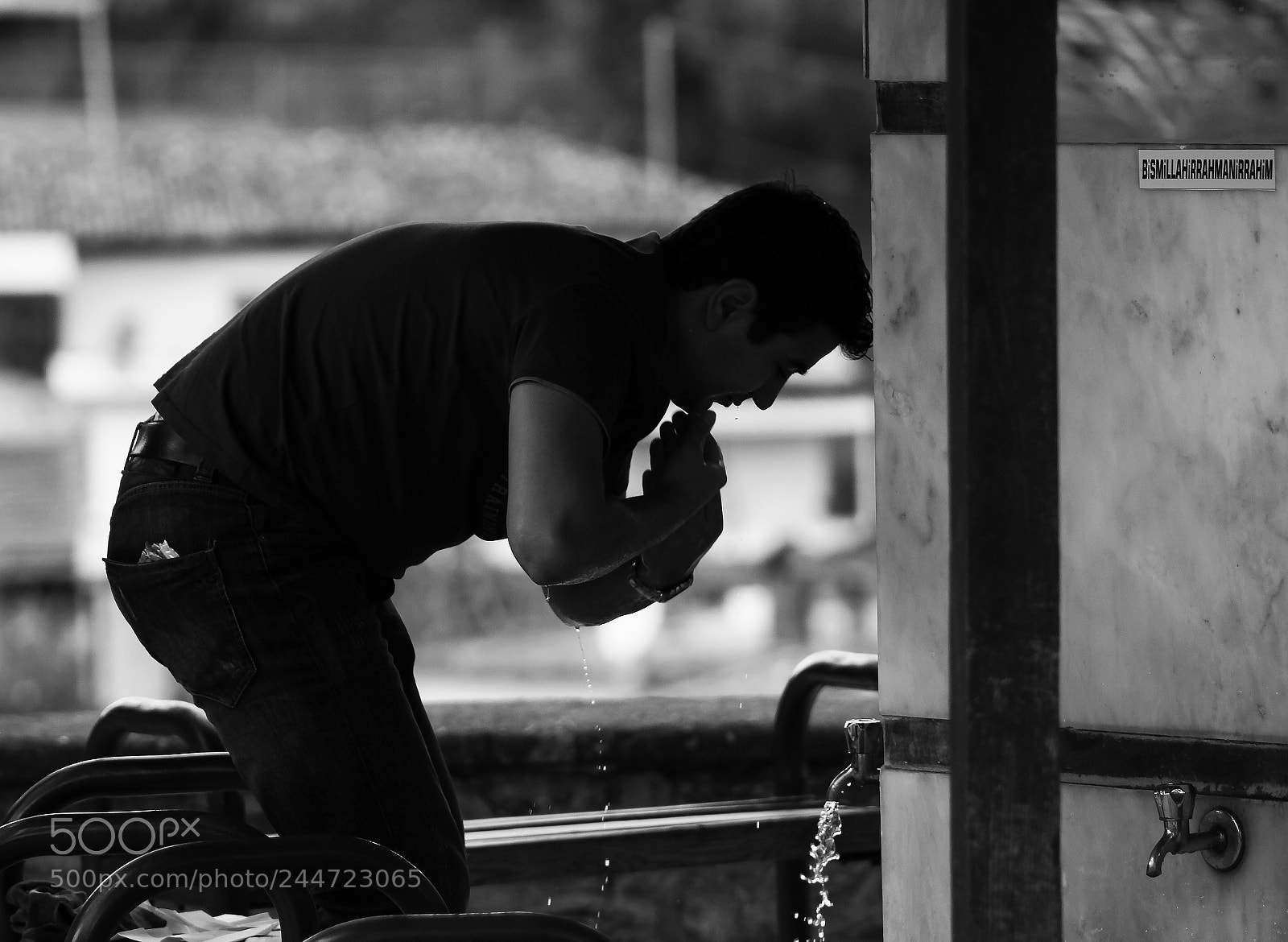 Canon EOS 60D sample photo. Man who perform ablution photography