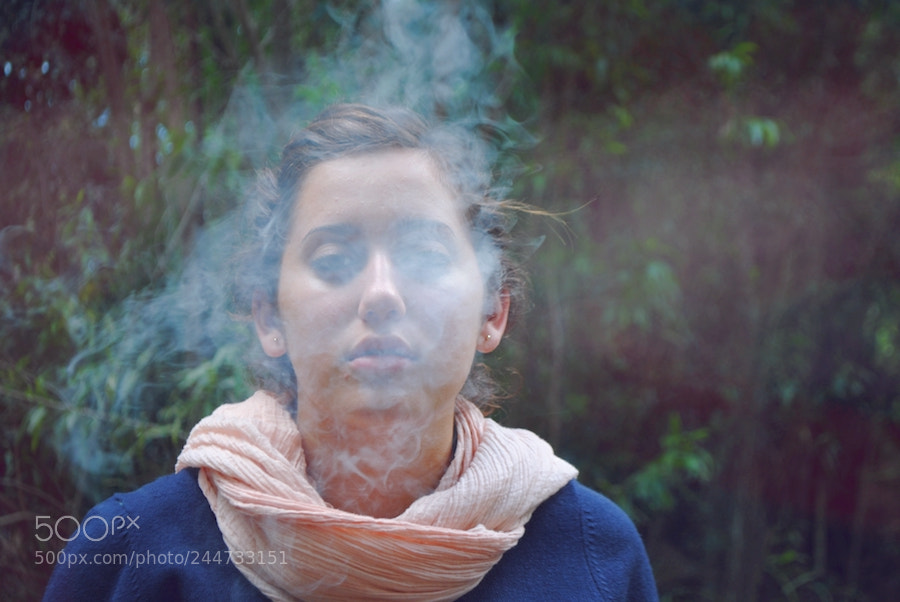 Nikon D3000 sample photo. Woman smokes a cigarette photography