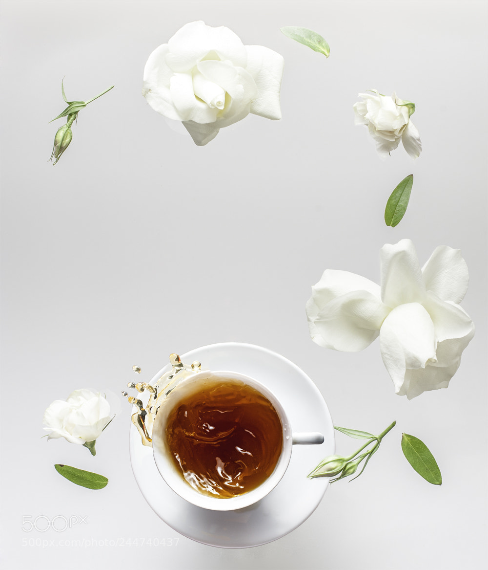 Nikon D700 sample photo. Flying roses splash tea photography