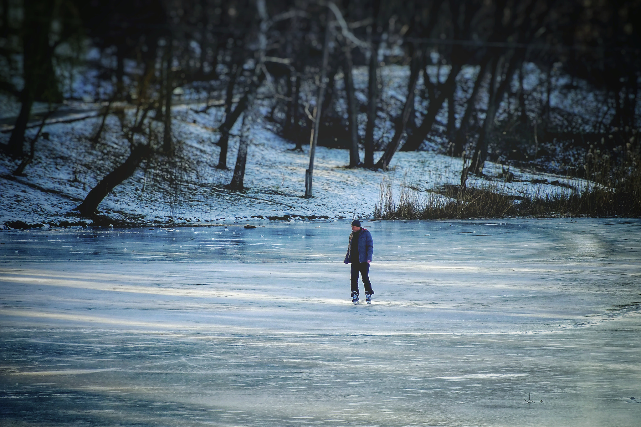 Fujifilm FinePix HS25EXR sample photo. Skating on the lake photography